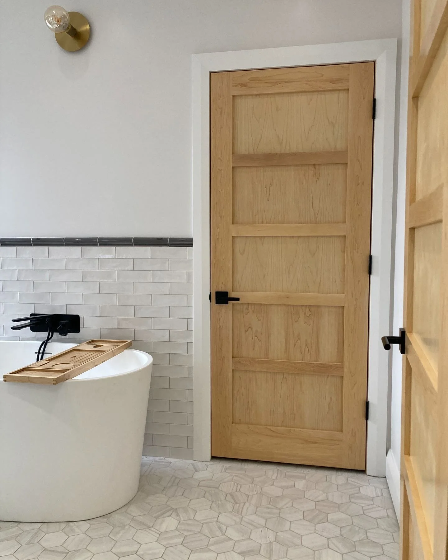 Old Ottawa South, SACHI designed bath. We fit a double vanity, stand alone tub, shower and laundry closet into one space. Homeowners did the reno themselves, beautiful job!