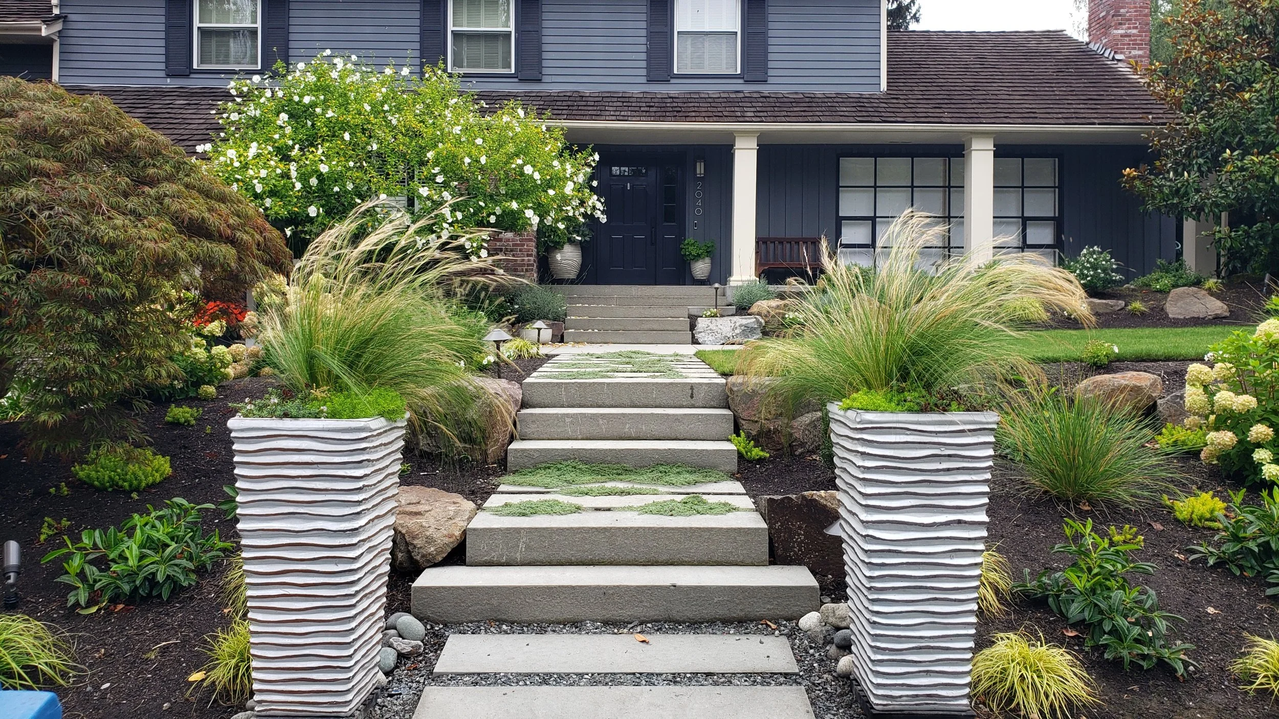 House with stone steps leading to front door