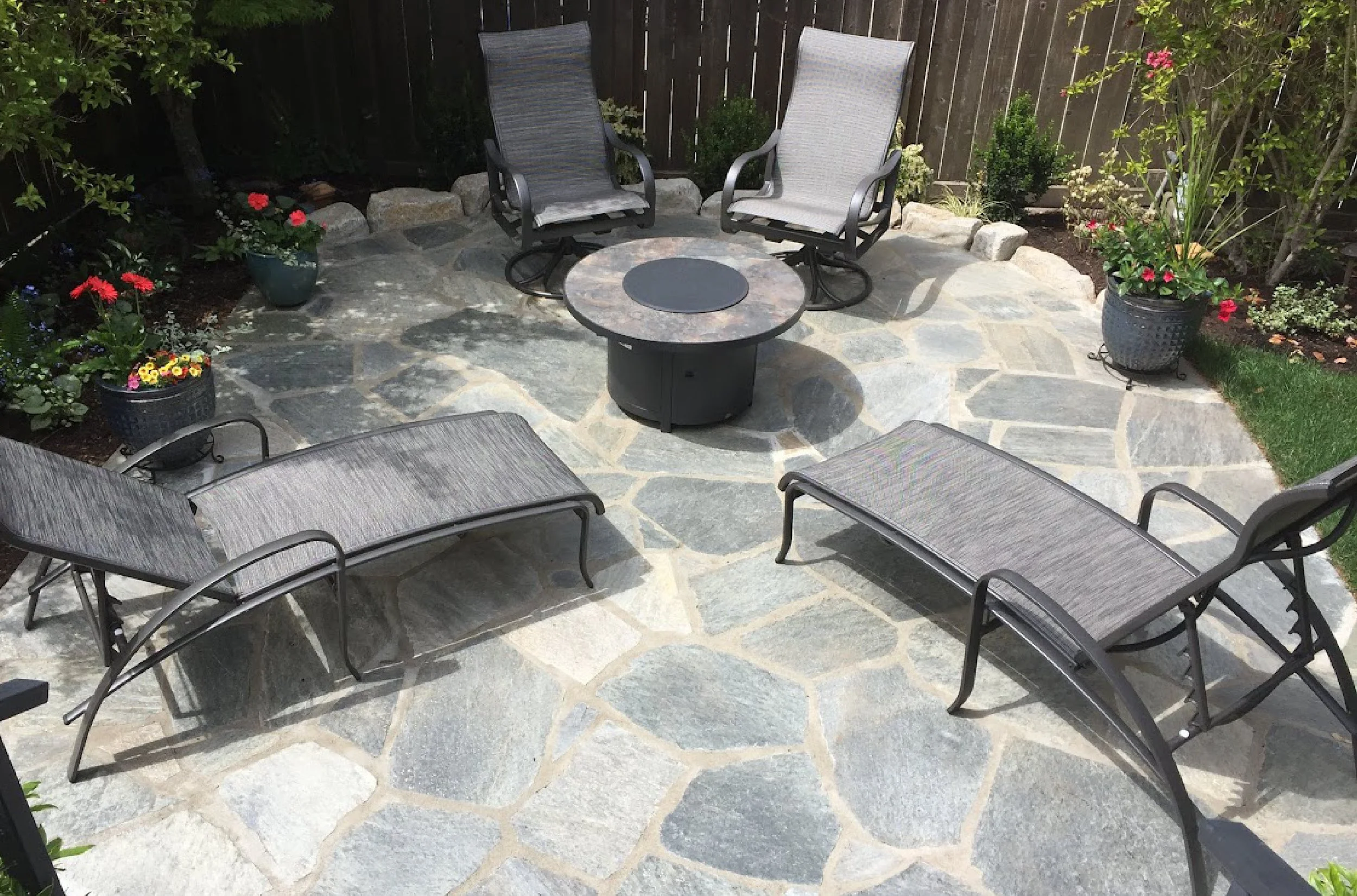 Photo of a mortar-set flagstone seating area.