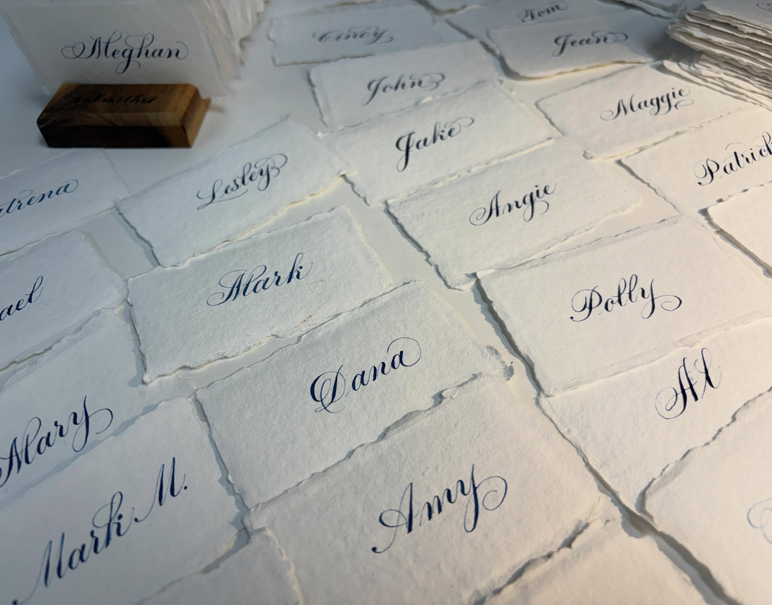 I thought these place cards needed a spot on my feed! The textured handmade paper was way easier to write on than anticipated. Love how soft and textured they look under that bright light. 💡 🖊️ 💙