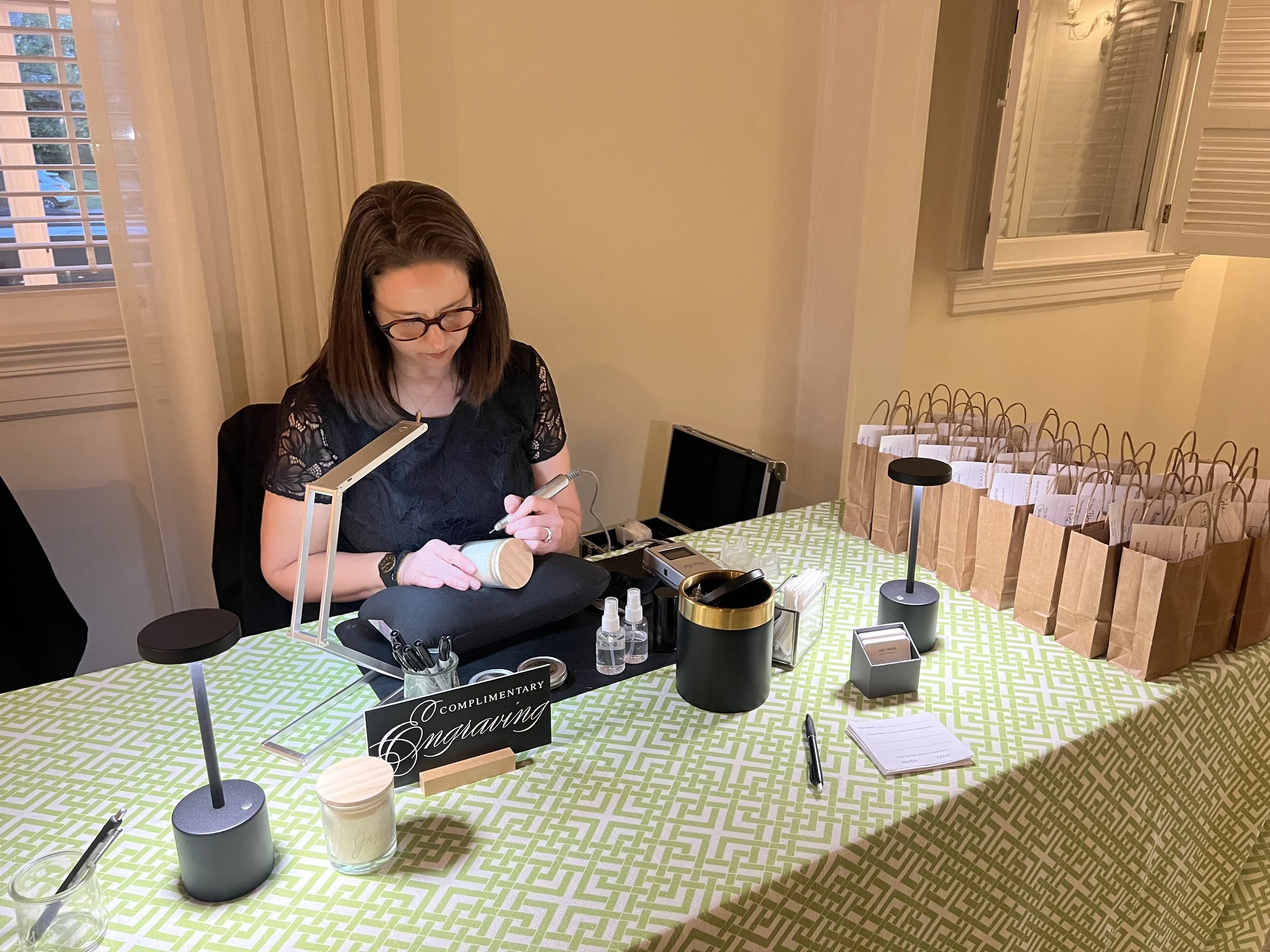 Engraving candles at a 70th birthday party