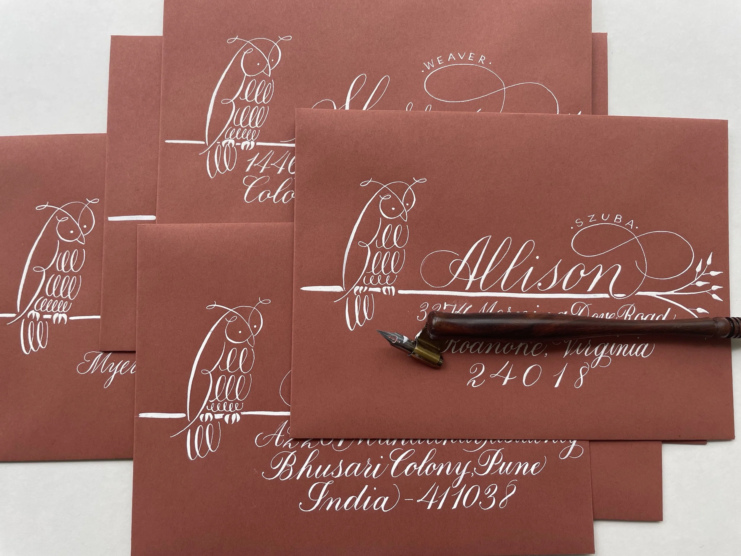 copperplate calligraphy envelopes with flourished owl