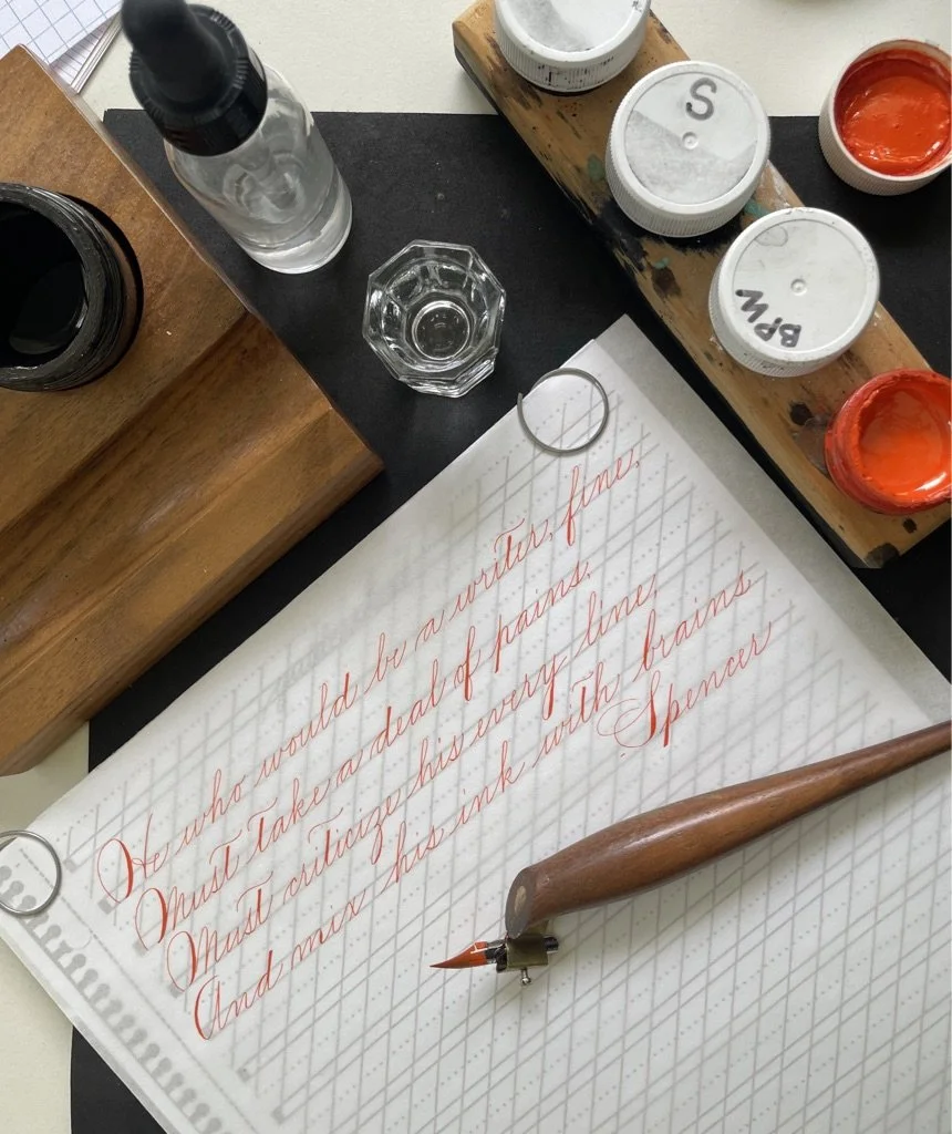Spencerian script practice in vermillion ink
