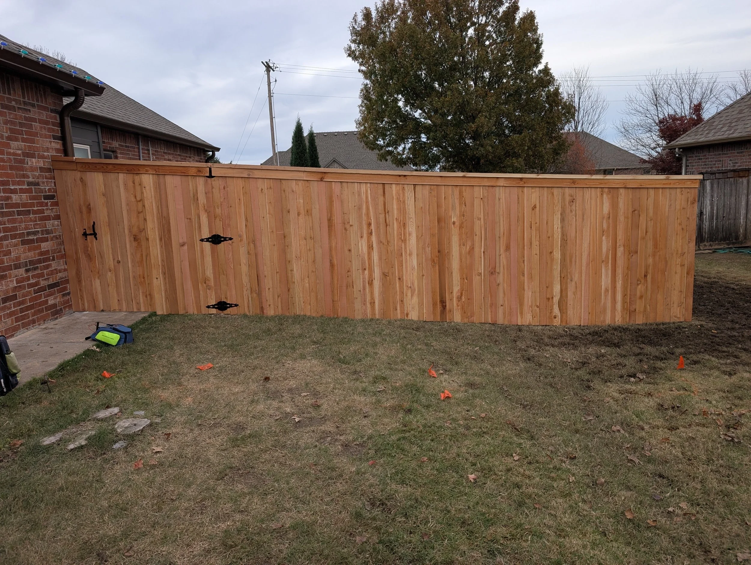 Cap and Trim Cedar Privacy Fence with Steel Posts