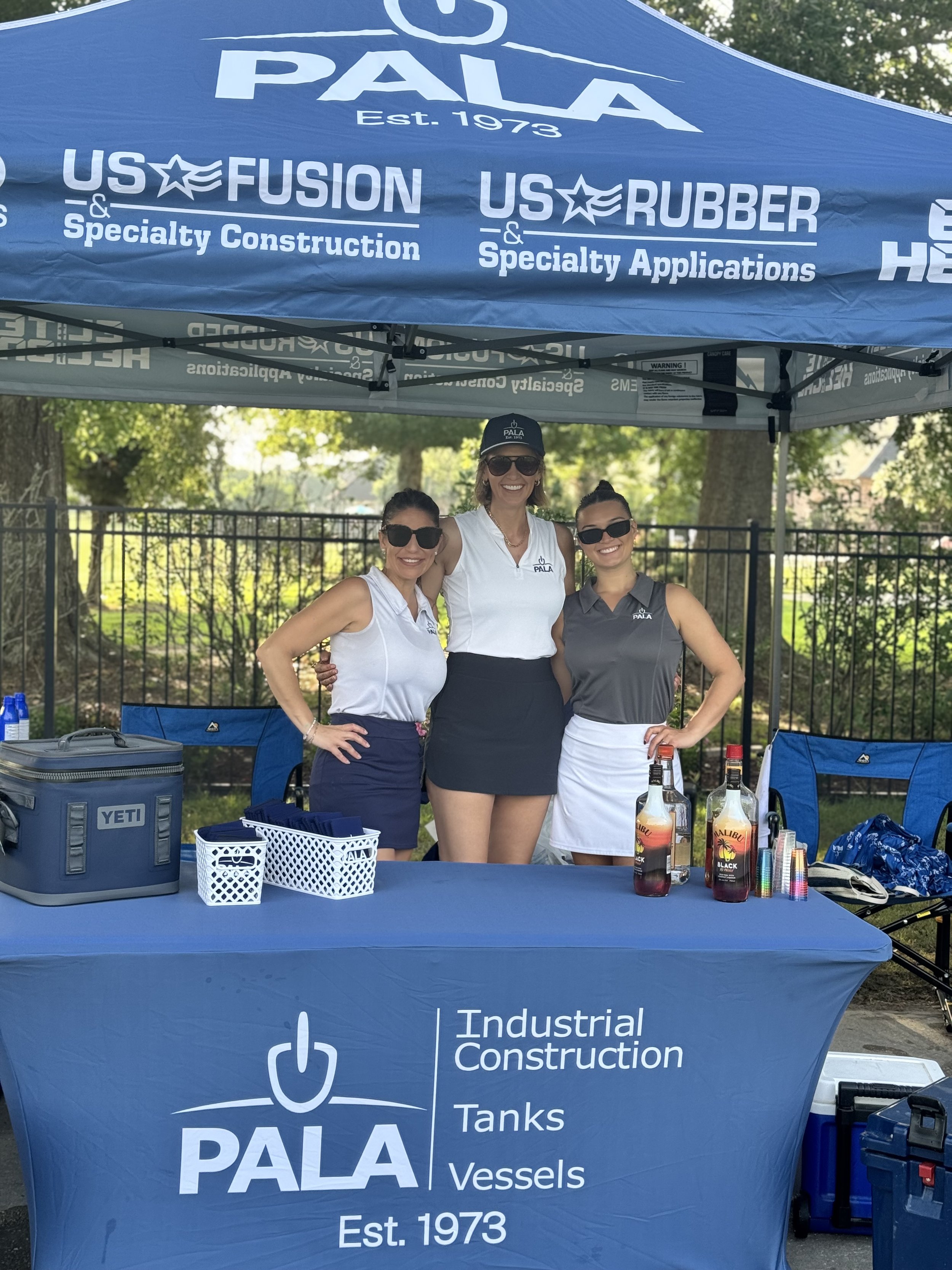 This is an Exxon United Way Golf Tournament sponsored by Pala(Hole #8), Pala hired Sneaux Candy to serve refreshments and attend the event. The sneauxballs were a hit, and the clients loved them! Pictured are the three Pala ladies representing!