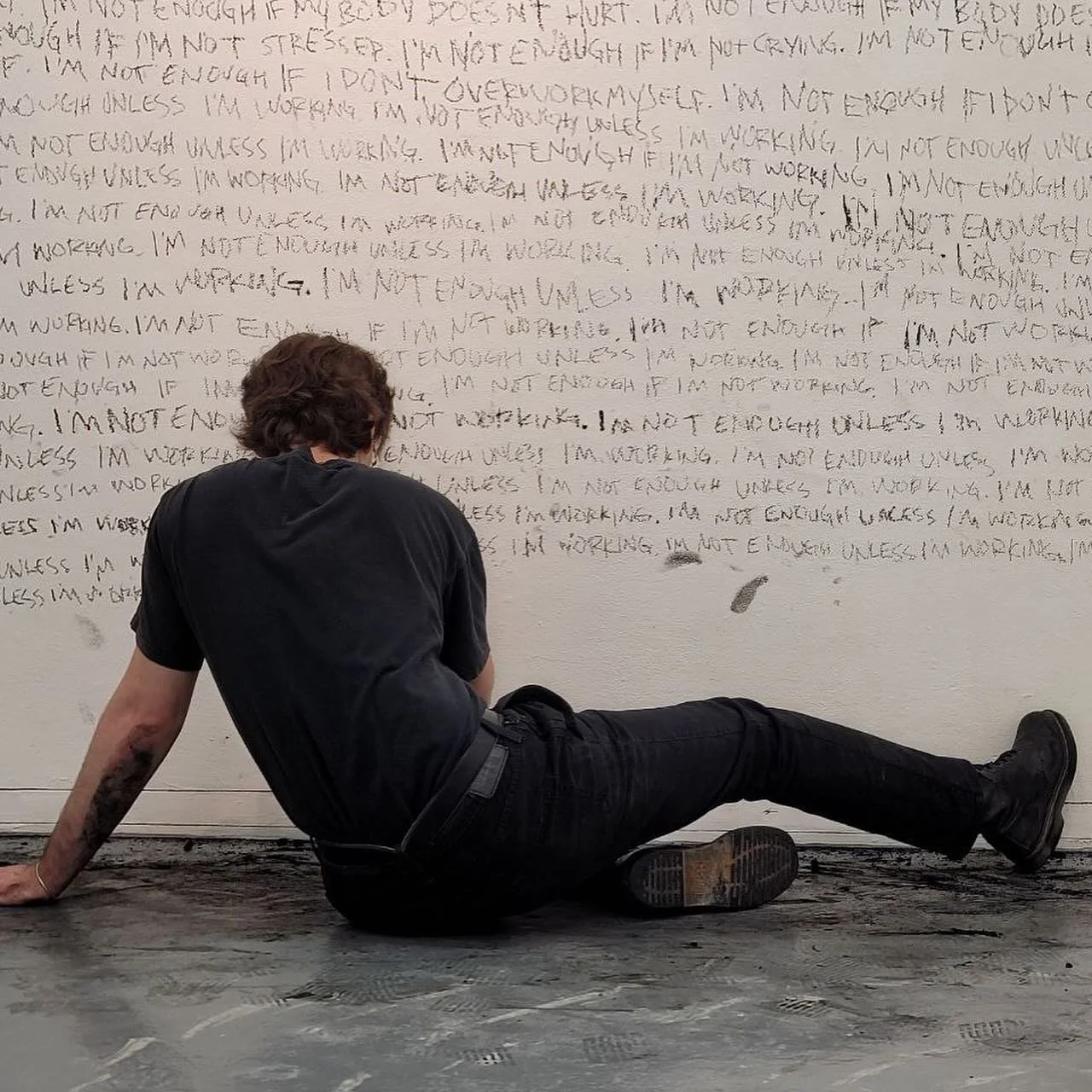 I&rsquo;M NOT ENOUGH UNLESS I&rsquo;M WORKING
2023
performance, charcoal, work

long overdue post of this performance from last semester. i wanted to demonstrate how much the urge to overwork myself had permeated my brain. i wrote &ldquo;i&rsquo;m no