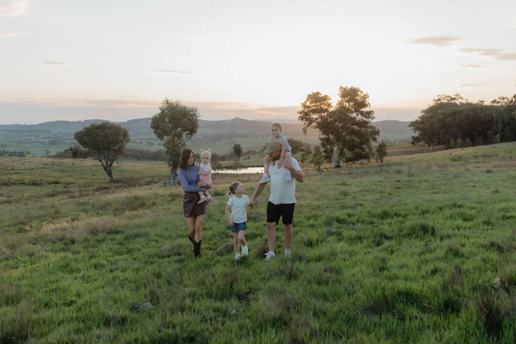 Lifestyle portrait of Tanya Wilcox, designer behind Zaii Studio, with family in a warm, candid moment