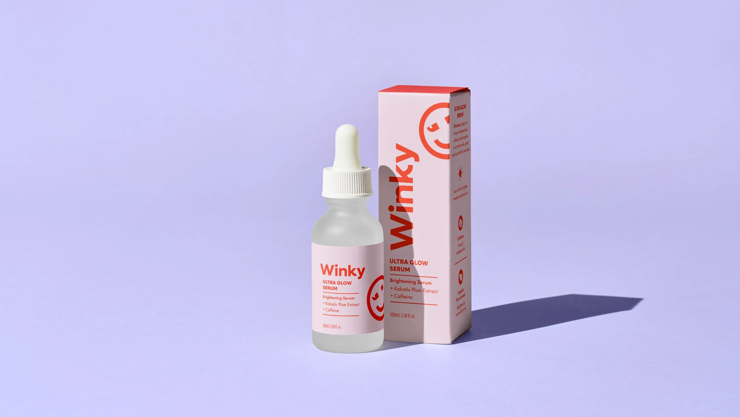 Ultra Glow Serum standing next to it's package