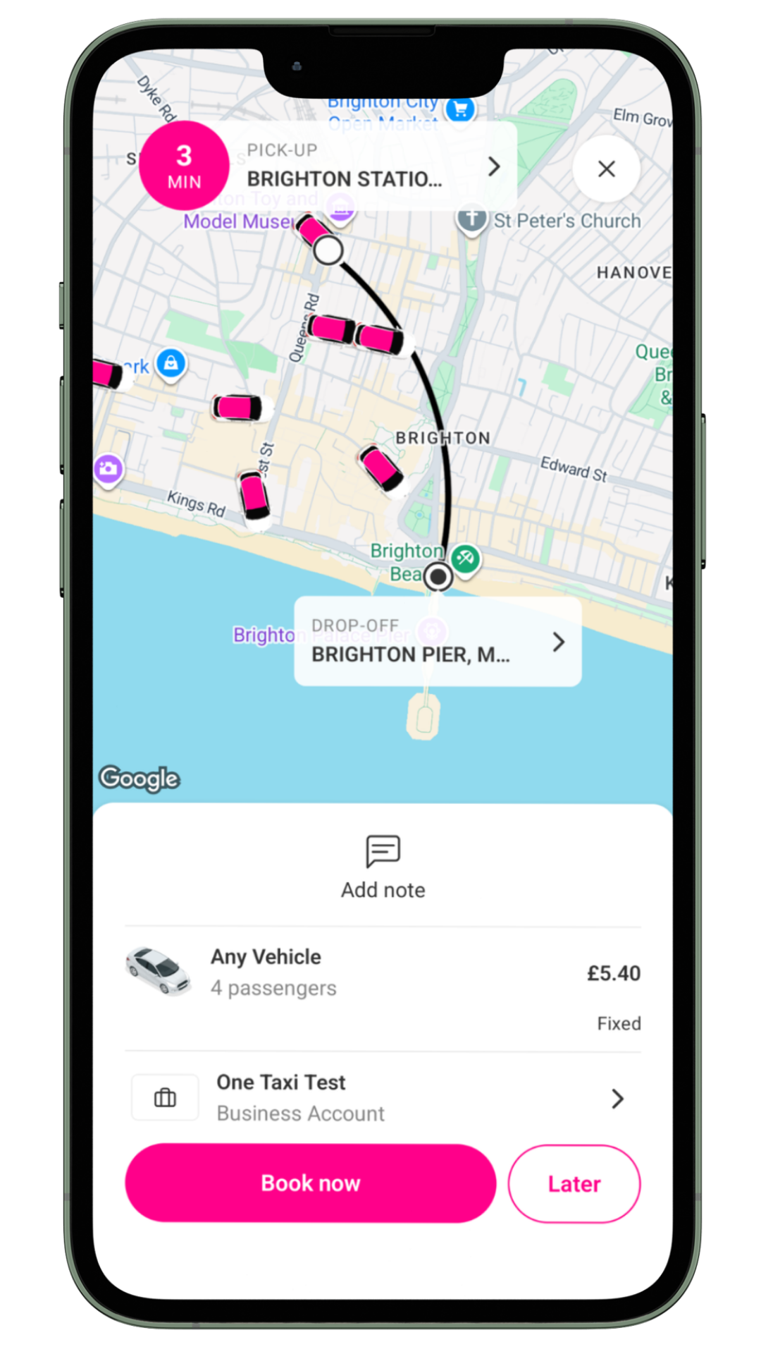 Mobile app showing a map of Brighton, UK, with a transportation route from Brighton Pier to Brighton Station, including icons of cars, and options to book or delay a taxi ride.