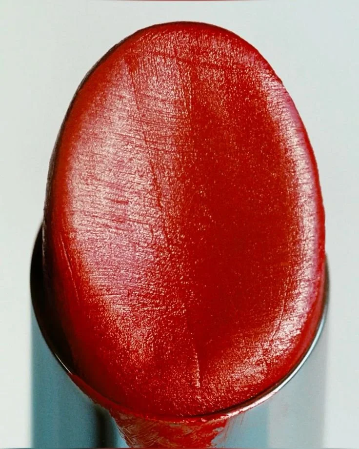 Close-up of a red popsicle on a stick.