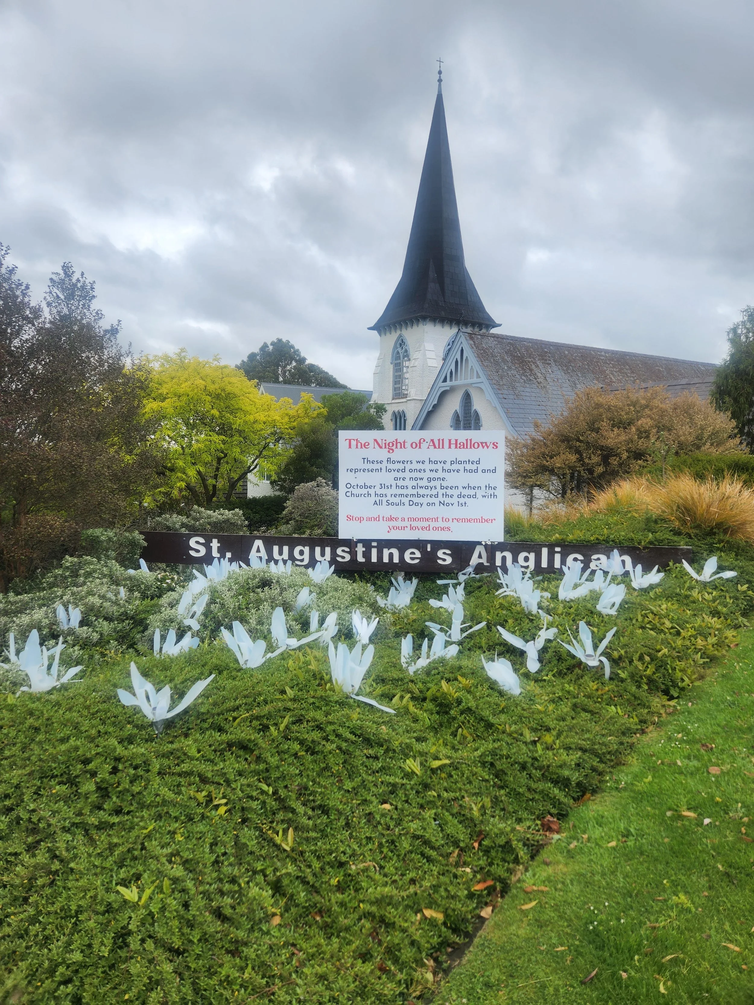 “The night of All Hallows” (with milk bottle flowers)