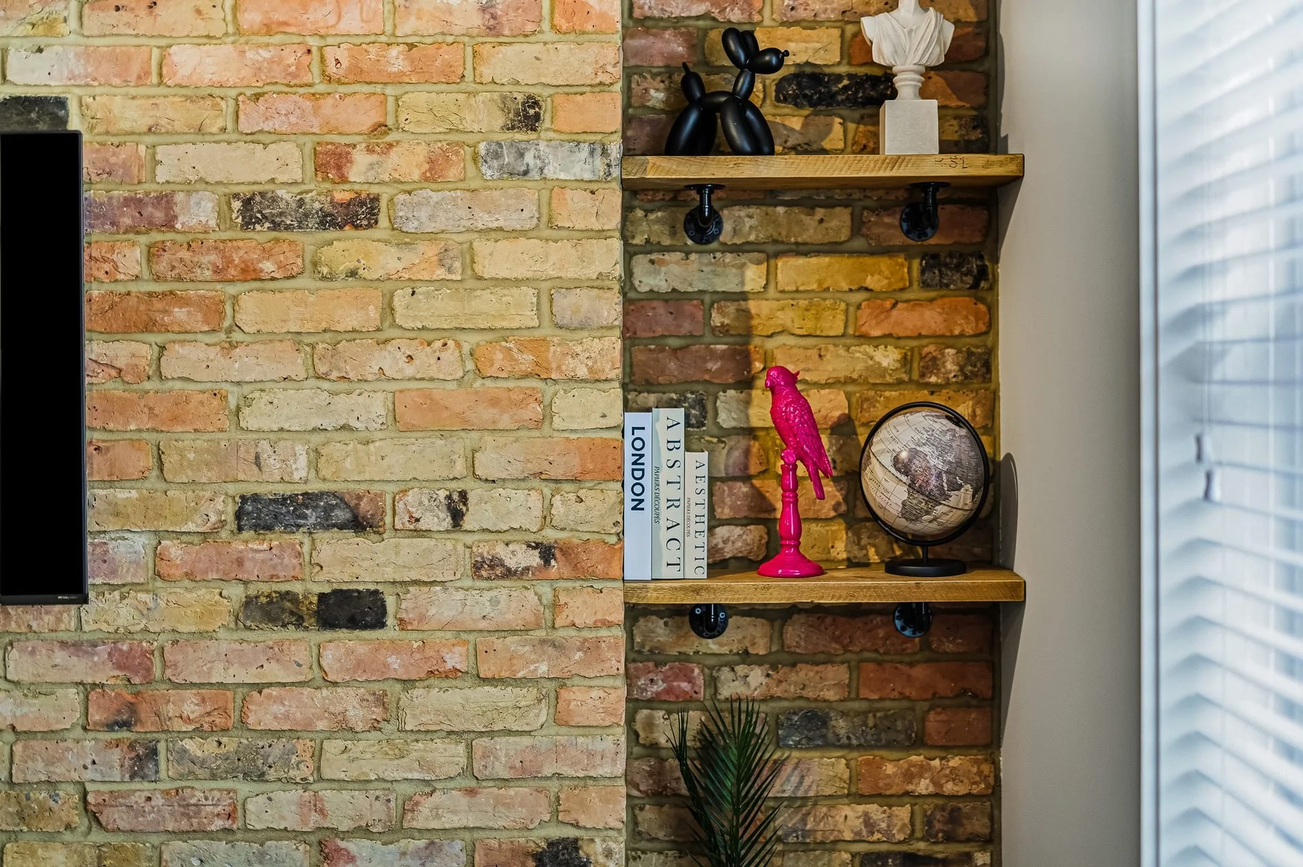 the-lofts-brick-wall-shelving-detail.jpg