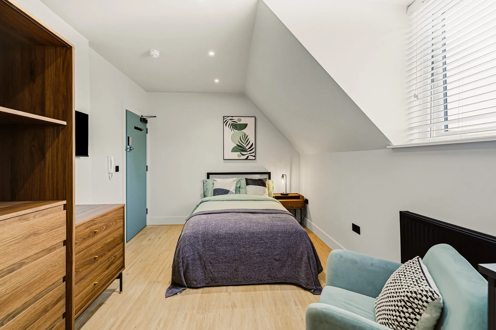the-lofts-loft-bedroom-sloped-ceiling.jpg