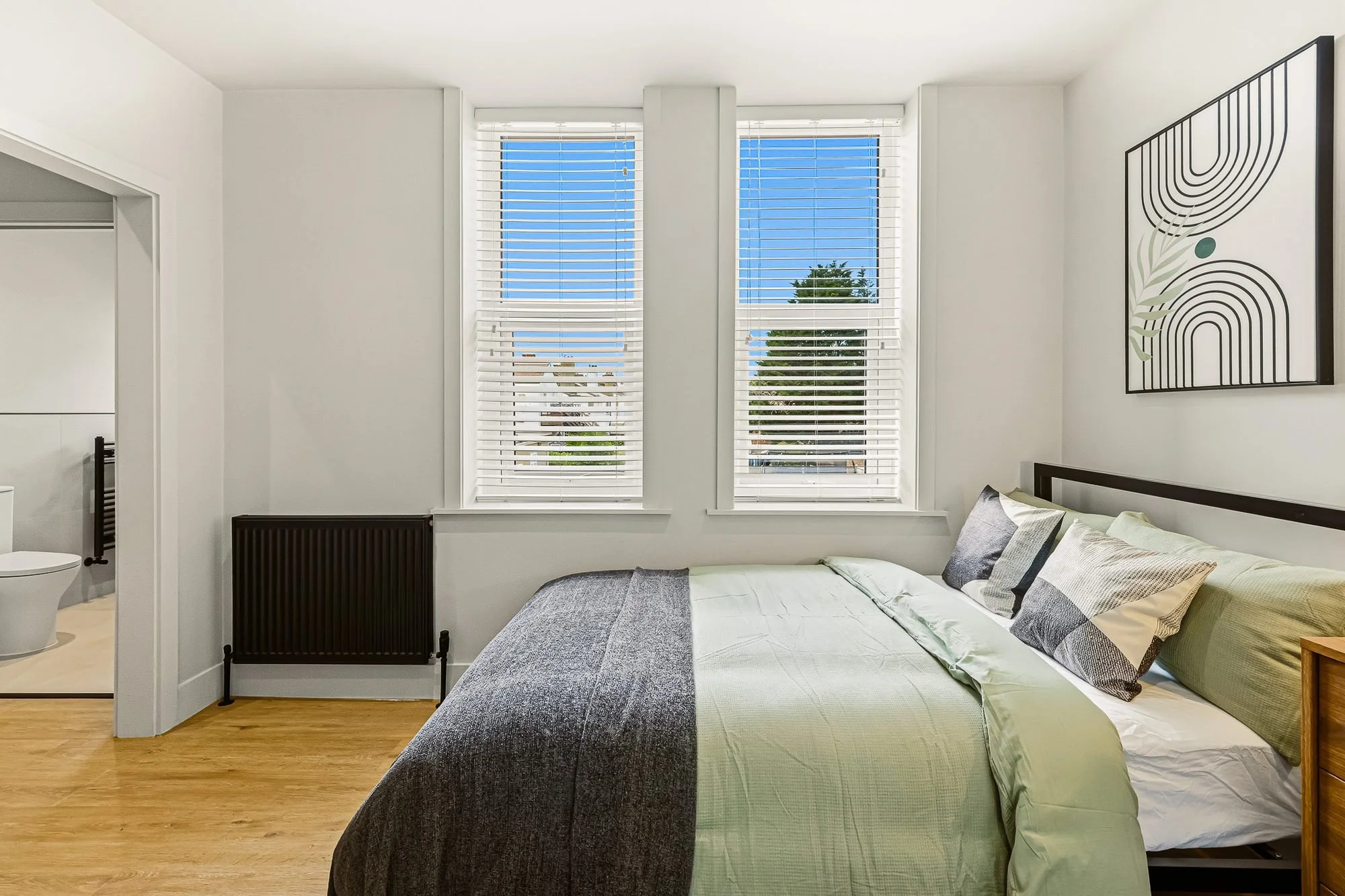 the-lofts-ensuite-bedroom-twin-windows.jpg