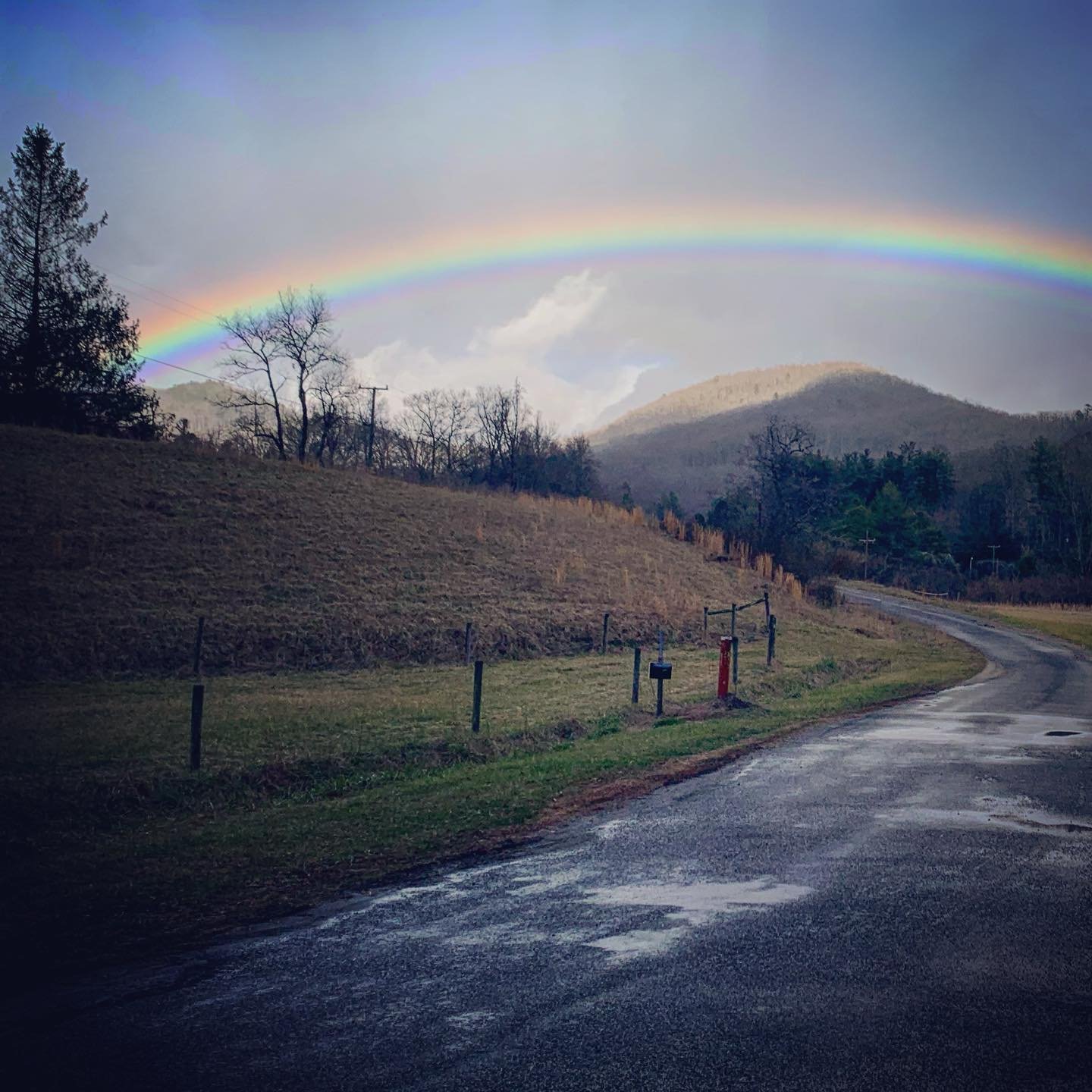Love it when you come home and find a rainbow just hanging out over the farm!! #rainbow #happyday #wnc #millsriver