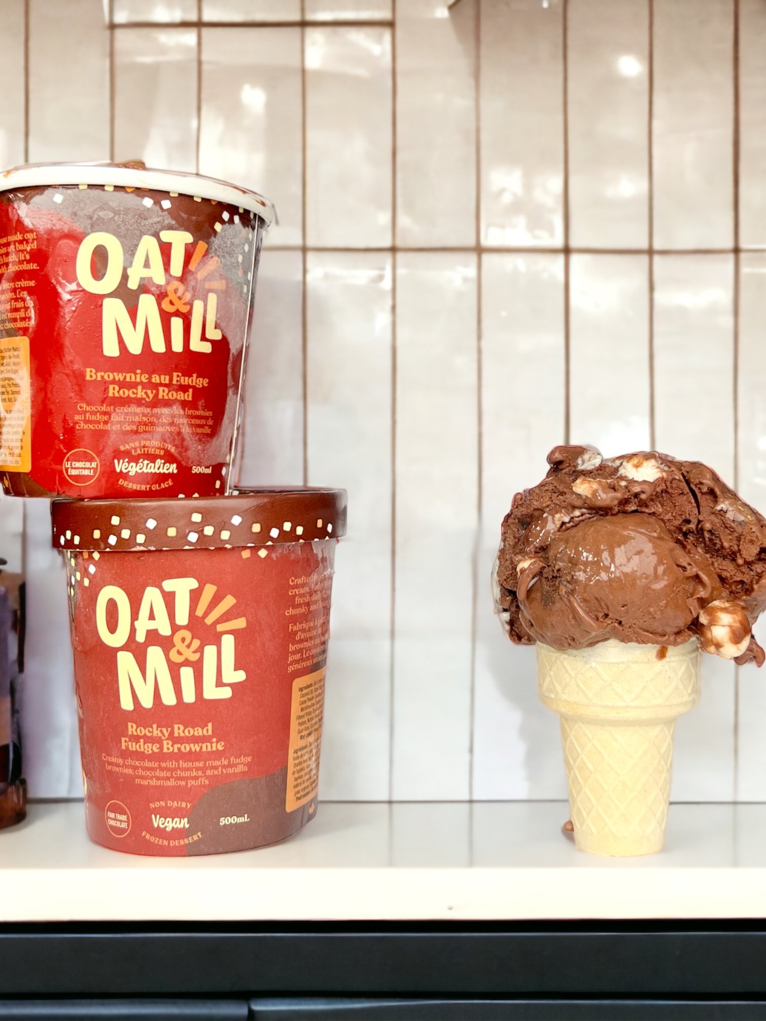 A pint of rocky road fudge brownie gelato with a chocolate base, fudge chunks, marshmallows, and nuts. Vegan, lactose-free, gluten-free, and kosher, made by a small business