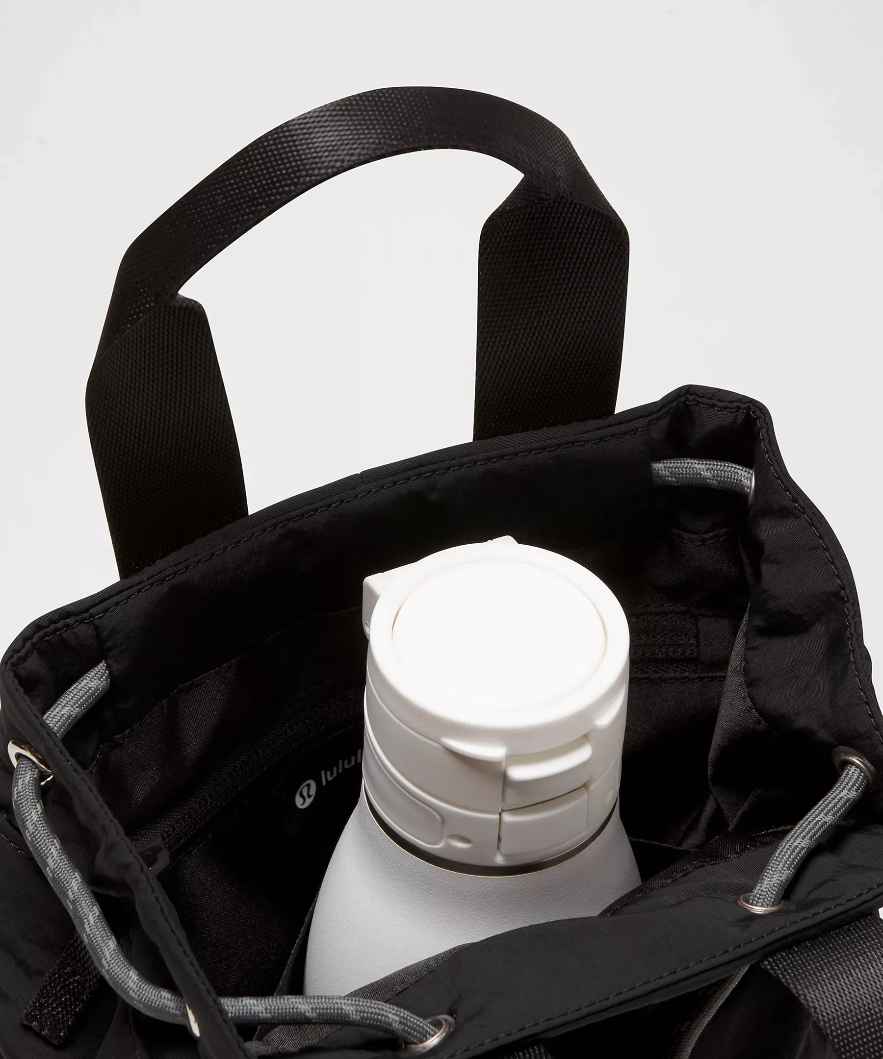 blackbucketbaginside.webp