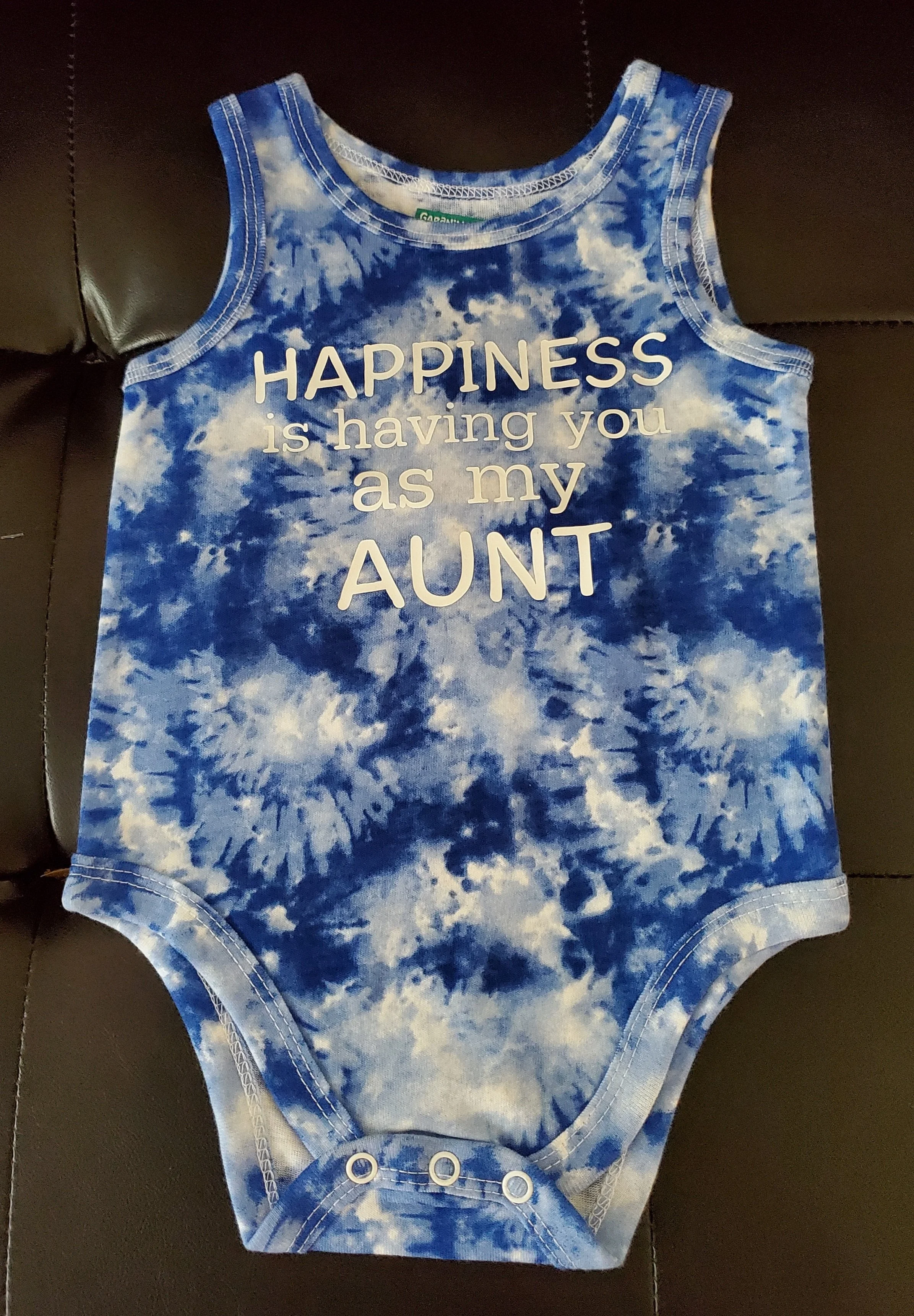 Blue and white tie-dye baby onesie with the text 'HAPPINESS is having you as my AUNT' printed on the front.