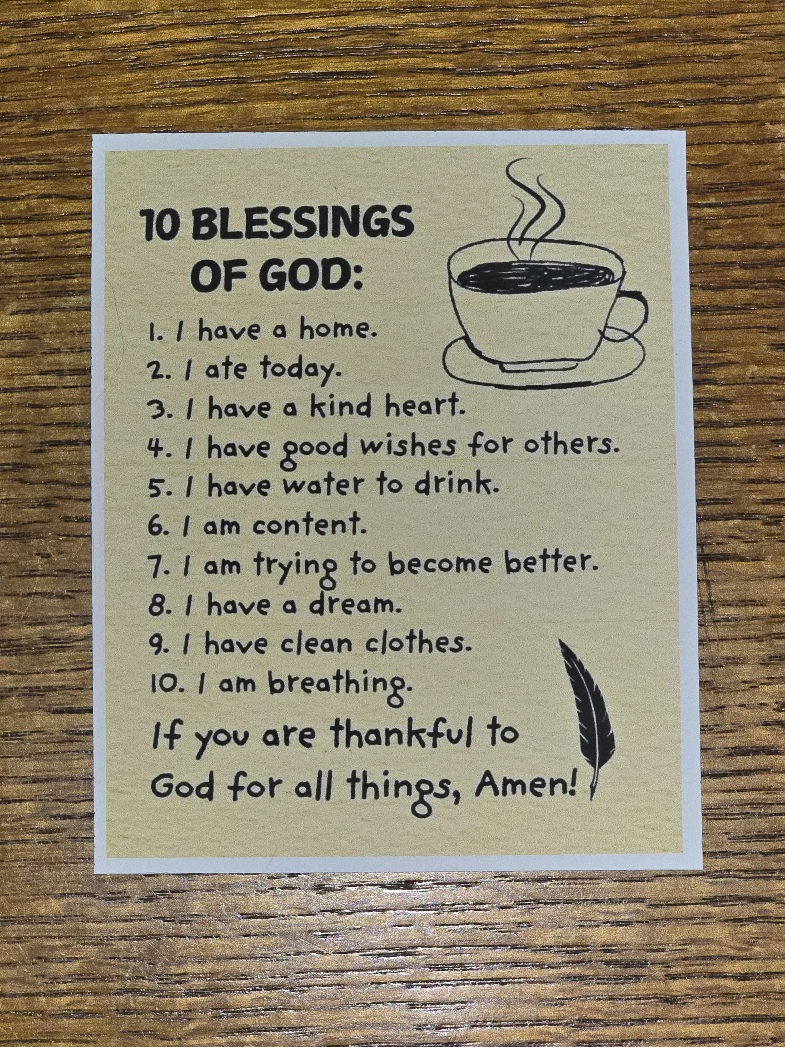 A list titled '10 Blessings of God' on a piece of paper with a drawing of a steaming cup of coffee and a feather. The list includes simple daily blessings and a note of gratitude at the bottom.