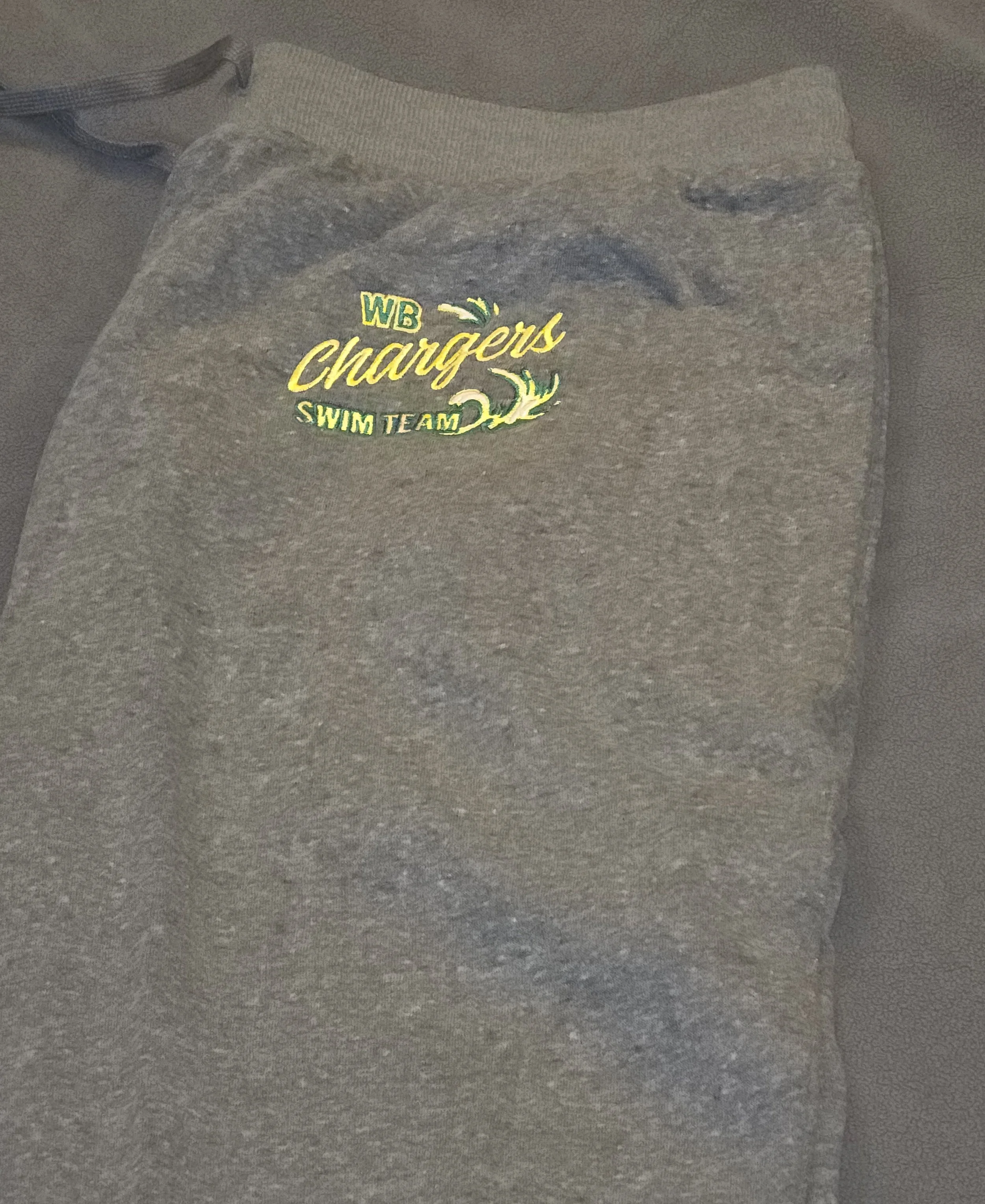 Gray sweatpants with an embroidered logo for WB Chargers Swim Team.