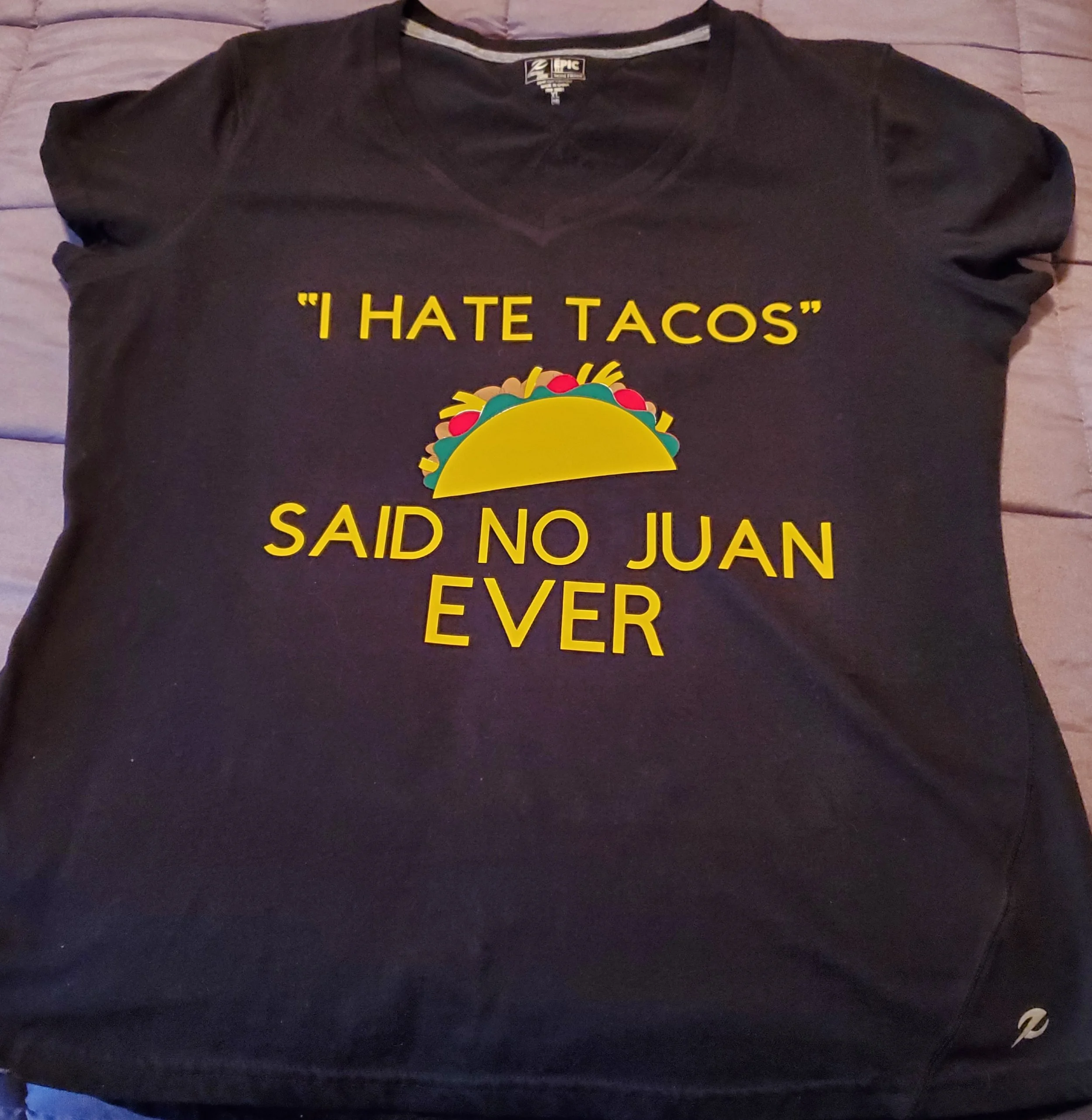 Black T-shirt with yellow text that reads 'I HATE TACOS' and 'SAID NO JUAN EVER', with a graphic of a taco in between.