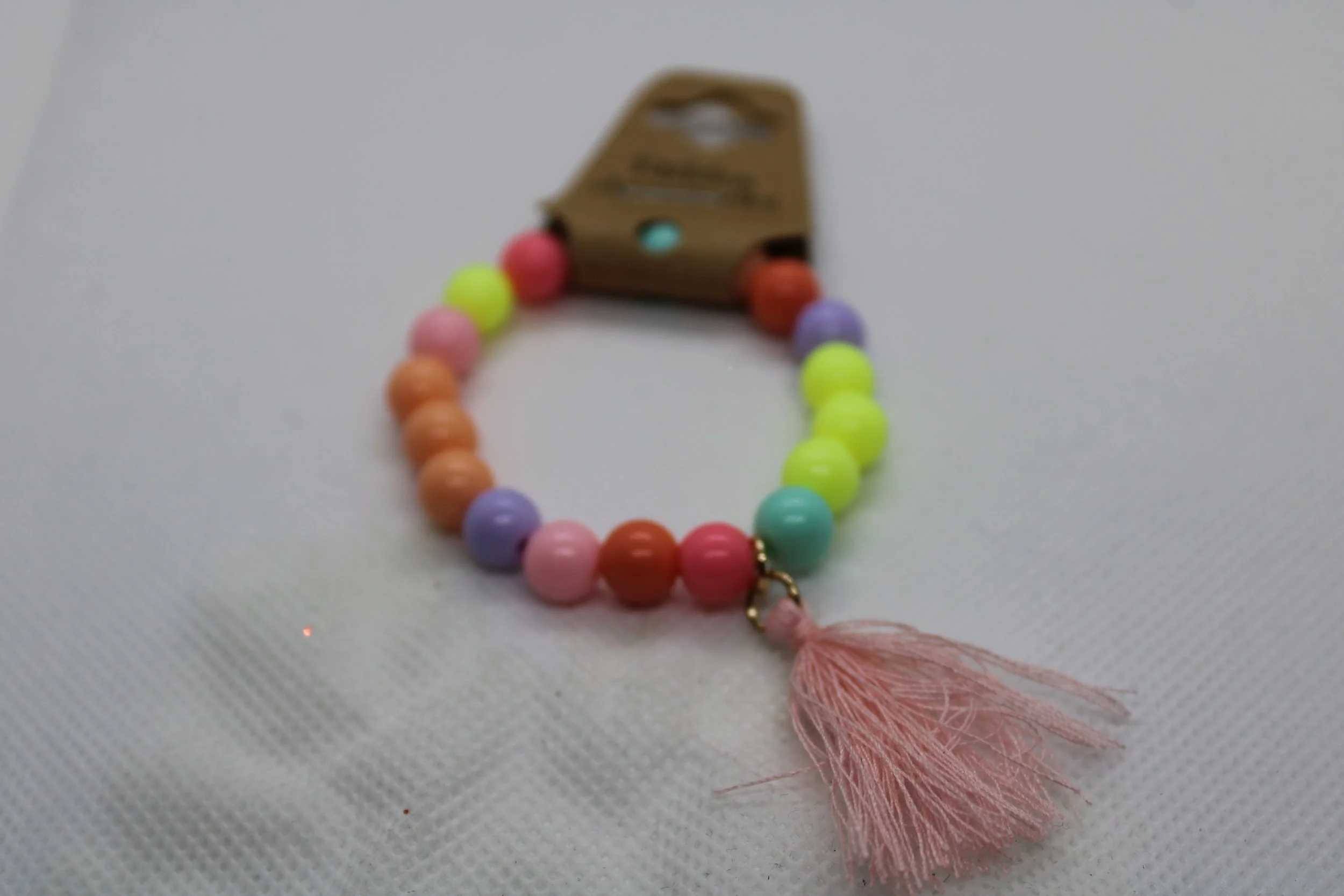 Children's Multicolor Bracelet With Pink Tassel