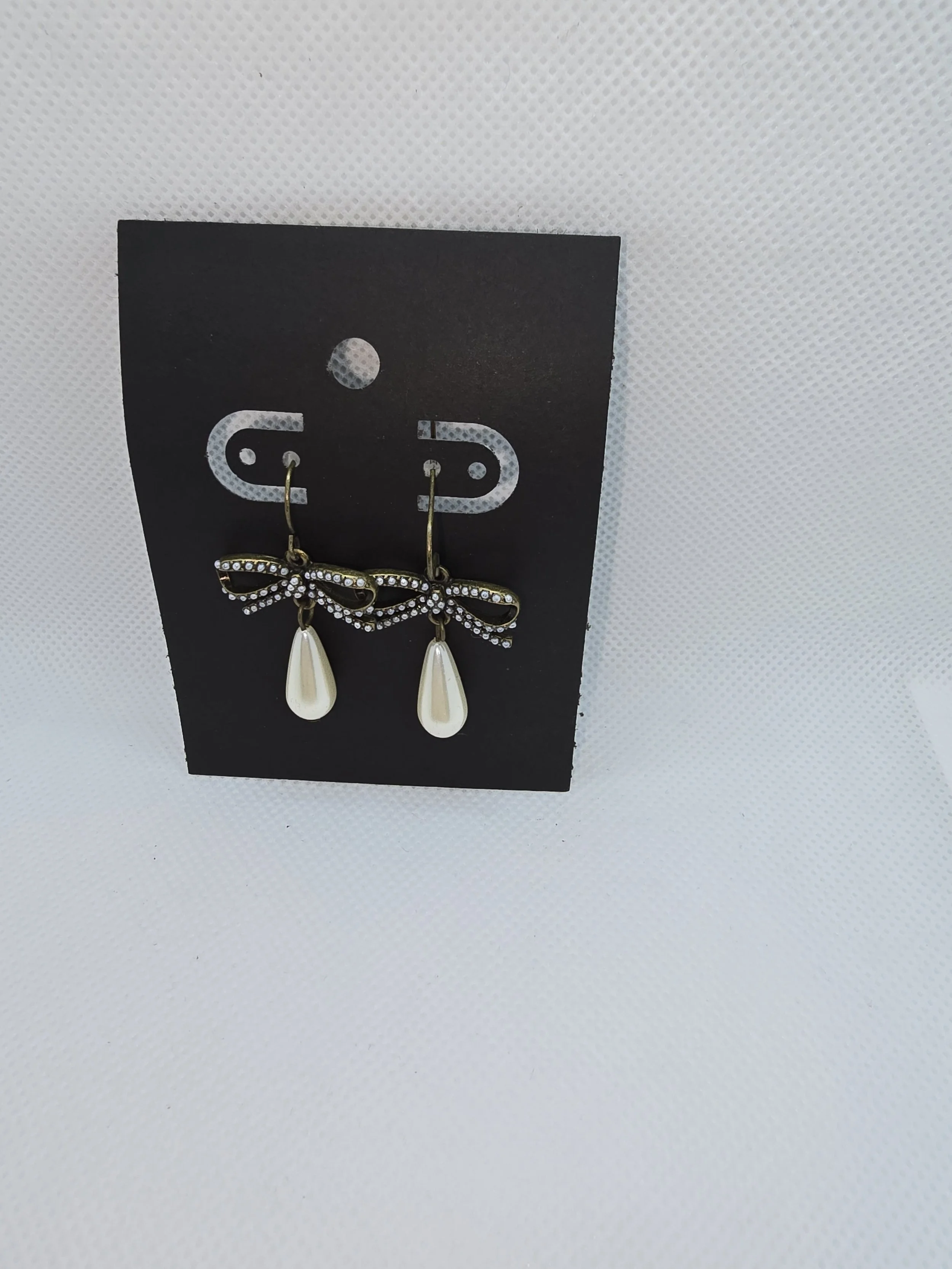 Bow with Teardrop Pearl Hanging Earrings