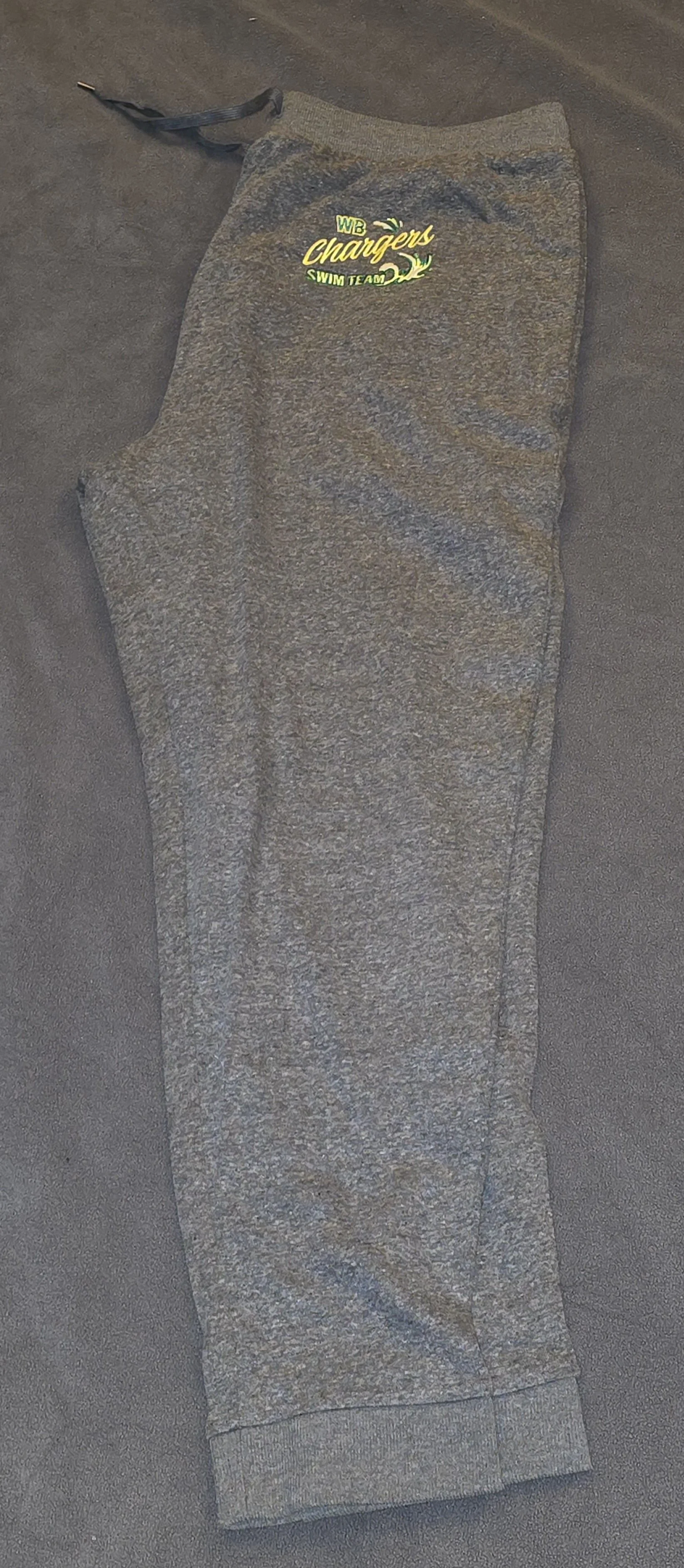 Gray sweatpants with a logo reading 'WB Chargers Swim Team' embroidered near the pocket.