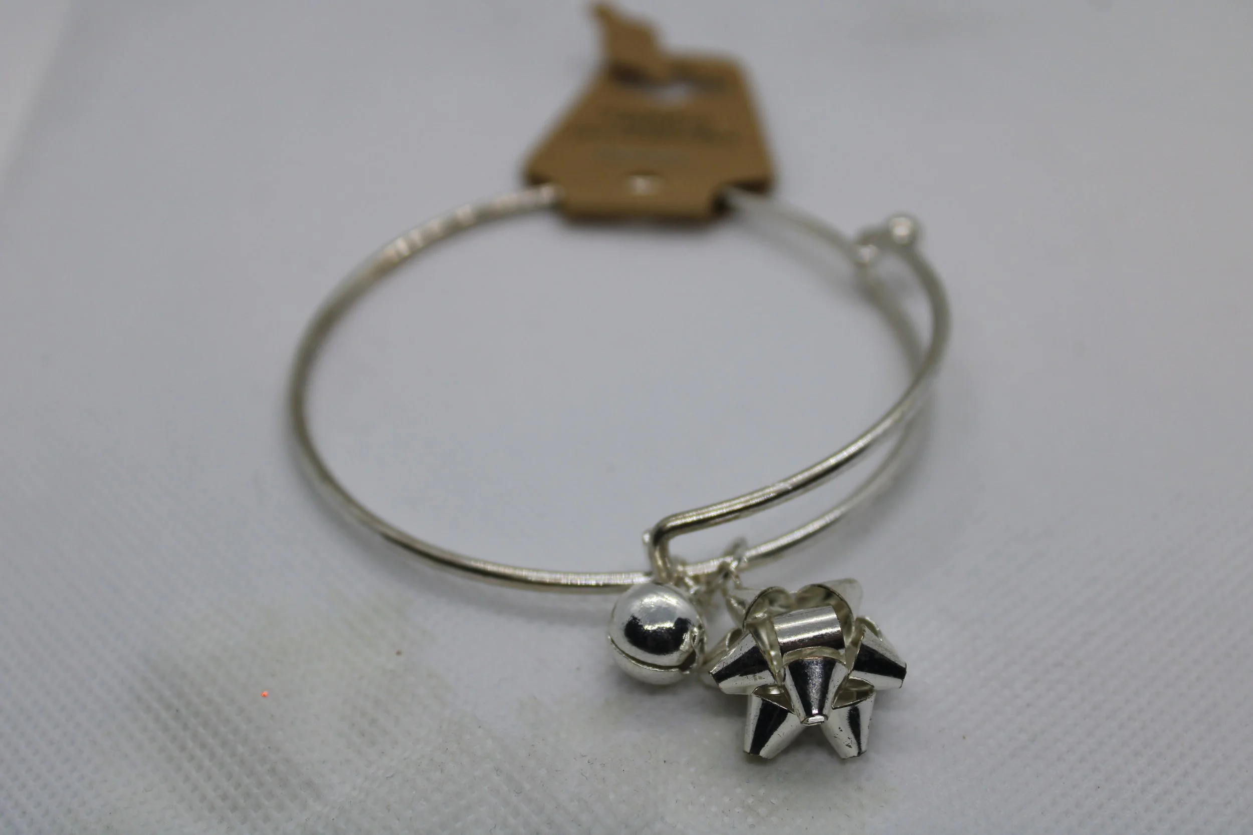 Silver Bracelet With Bell & Bow