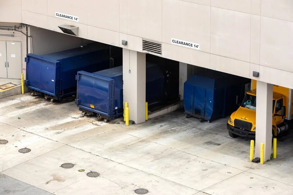 Commercial loading dock with dumpsters