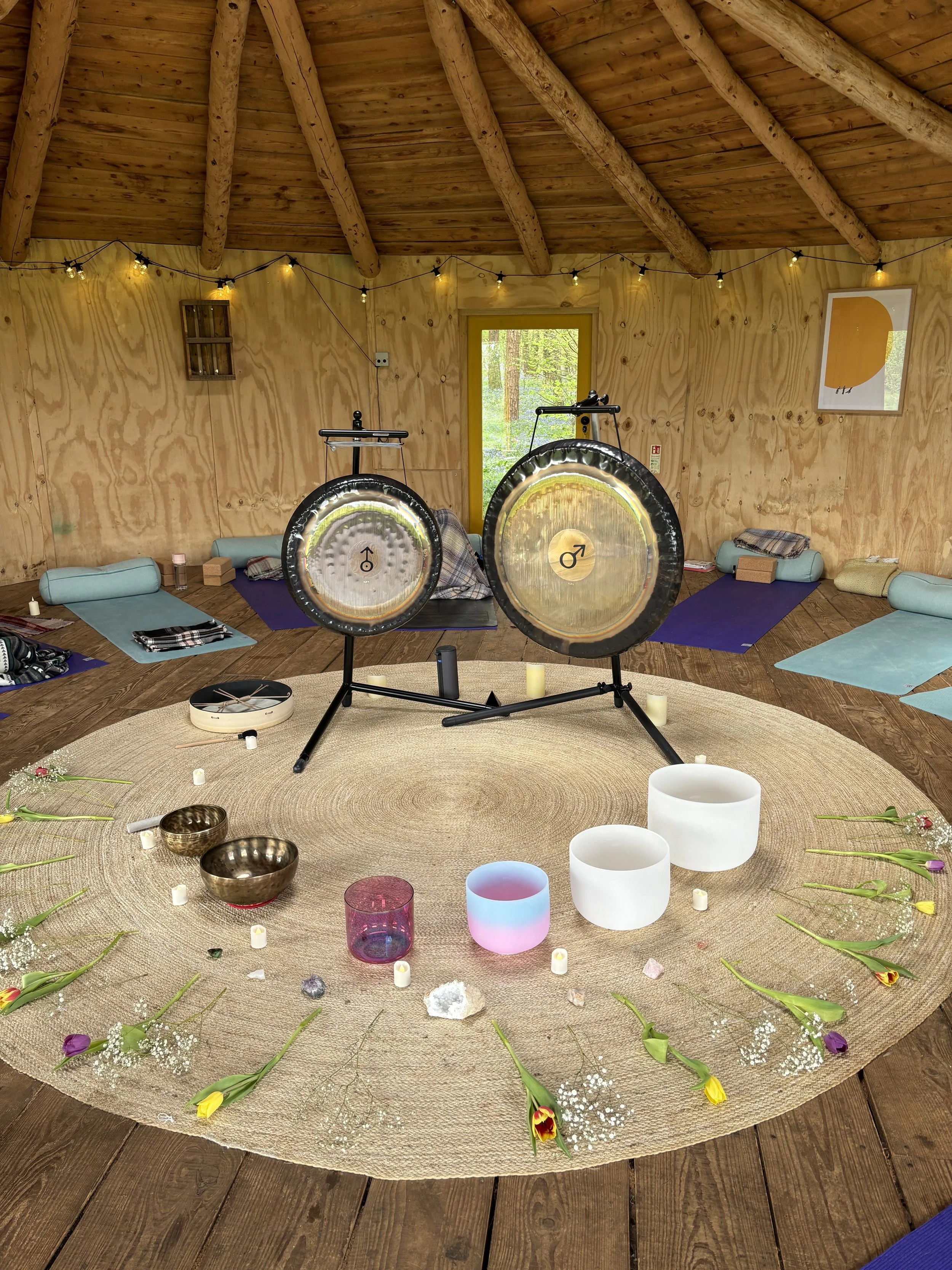 sound healing equipment in a wooden roundhouse