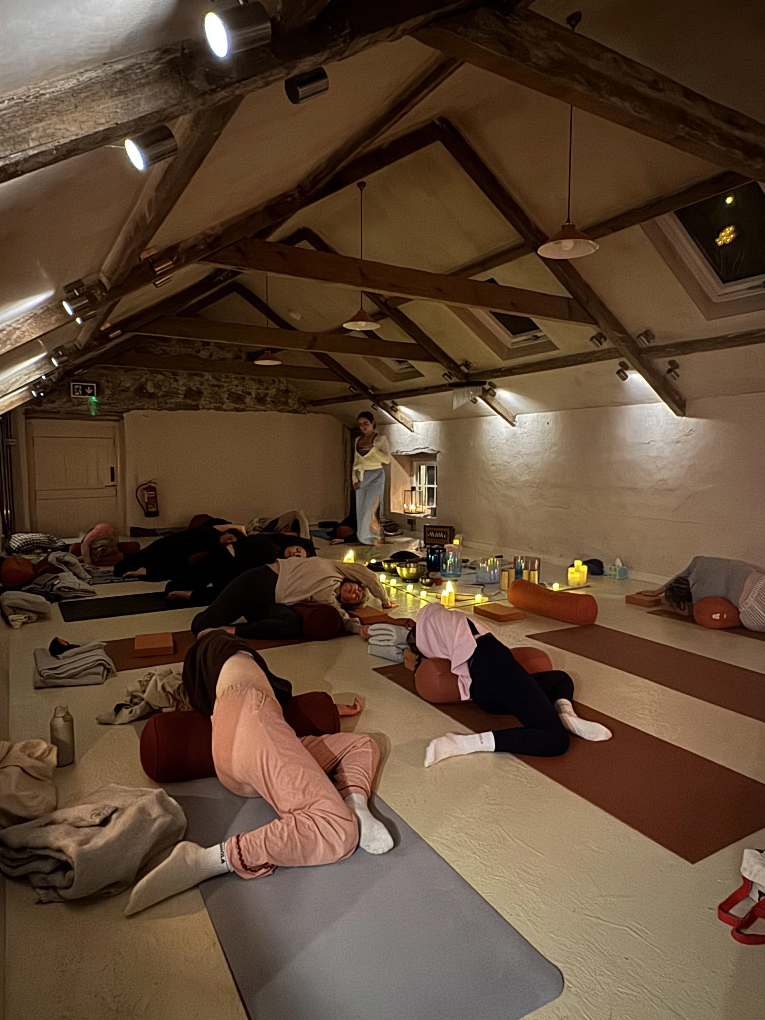 candlelit restorative yoga class