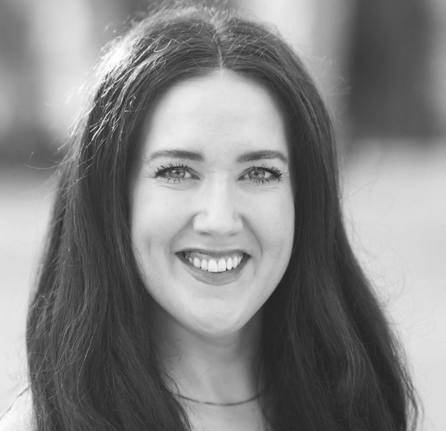 Black and white portrait of a Laura Berringer, who is an expert in neurodiversity and is working on several content projects with Peopling.  