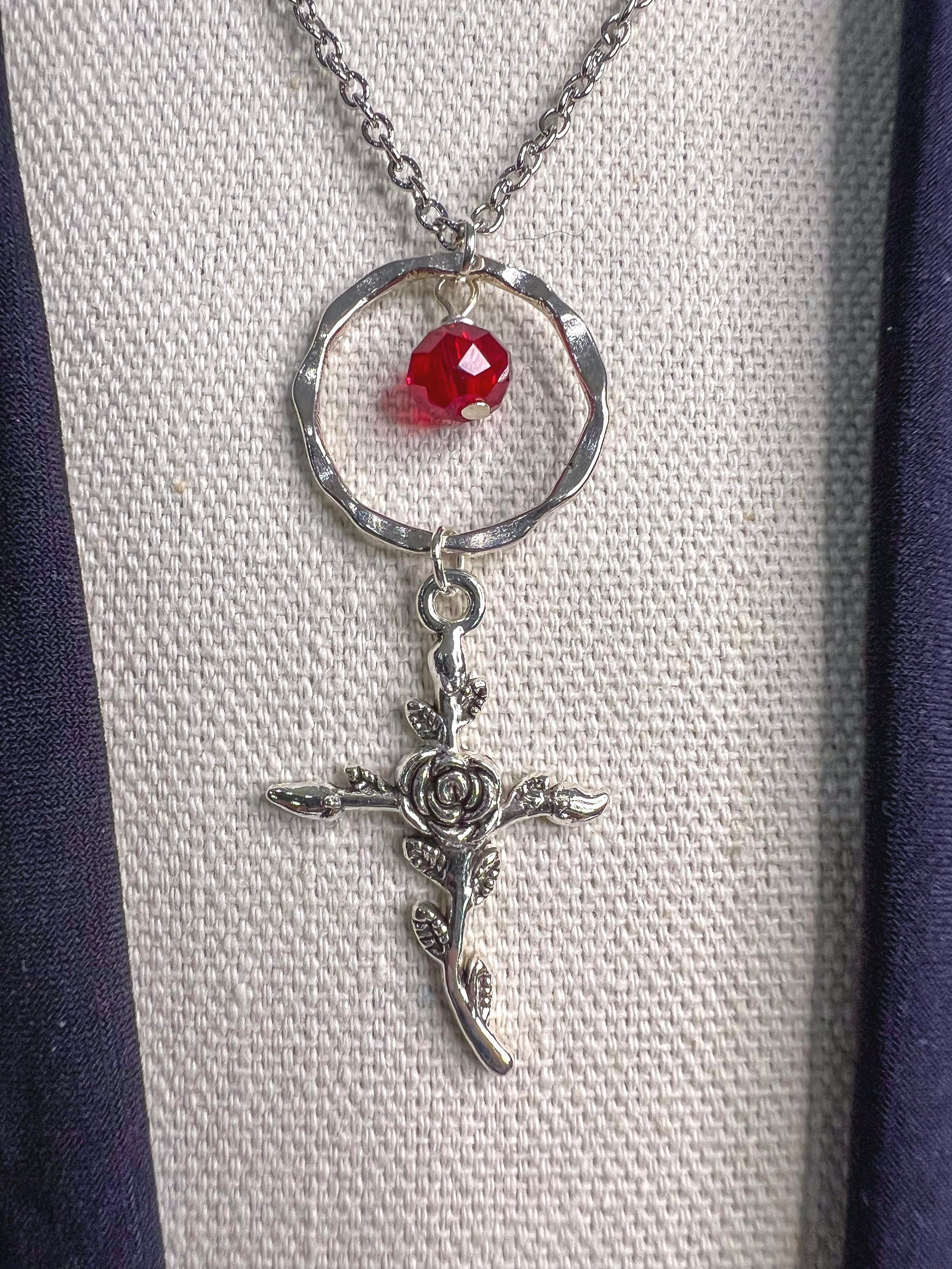 Red+bead+and+rose+cross+necklace.jpg