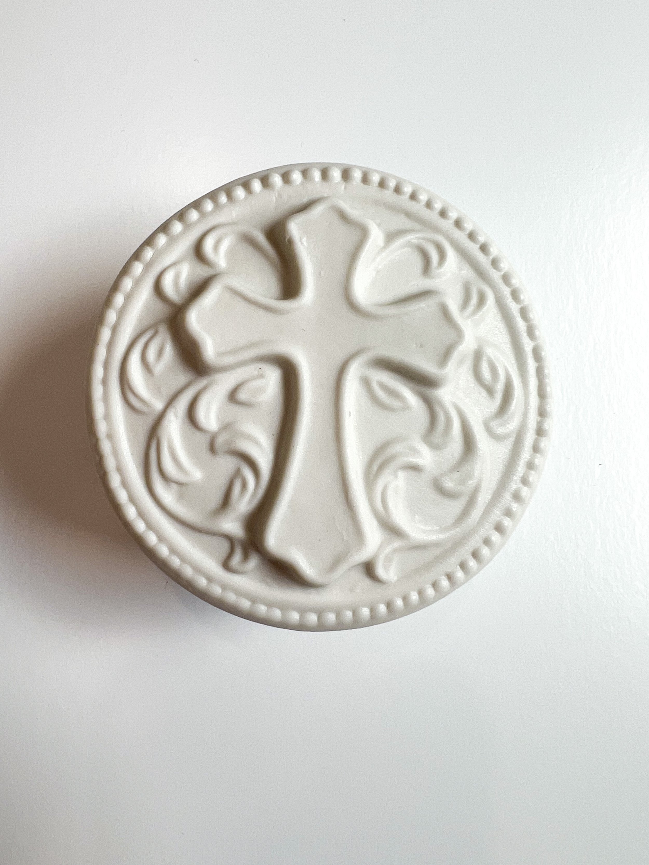 top of circular rosary box.jpg