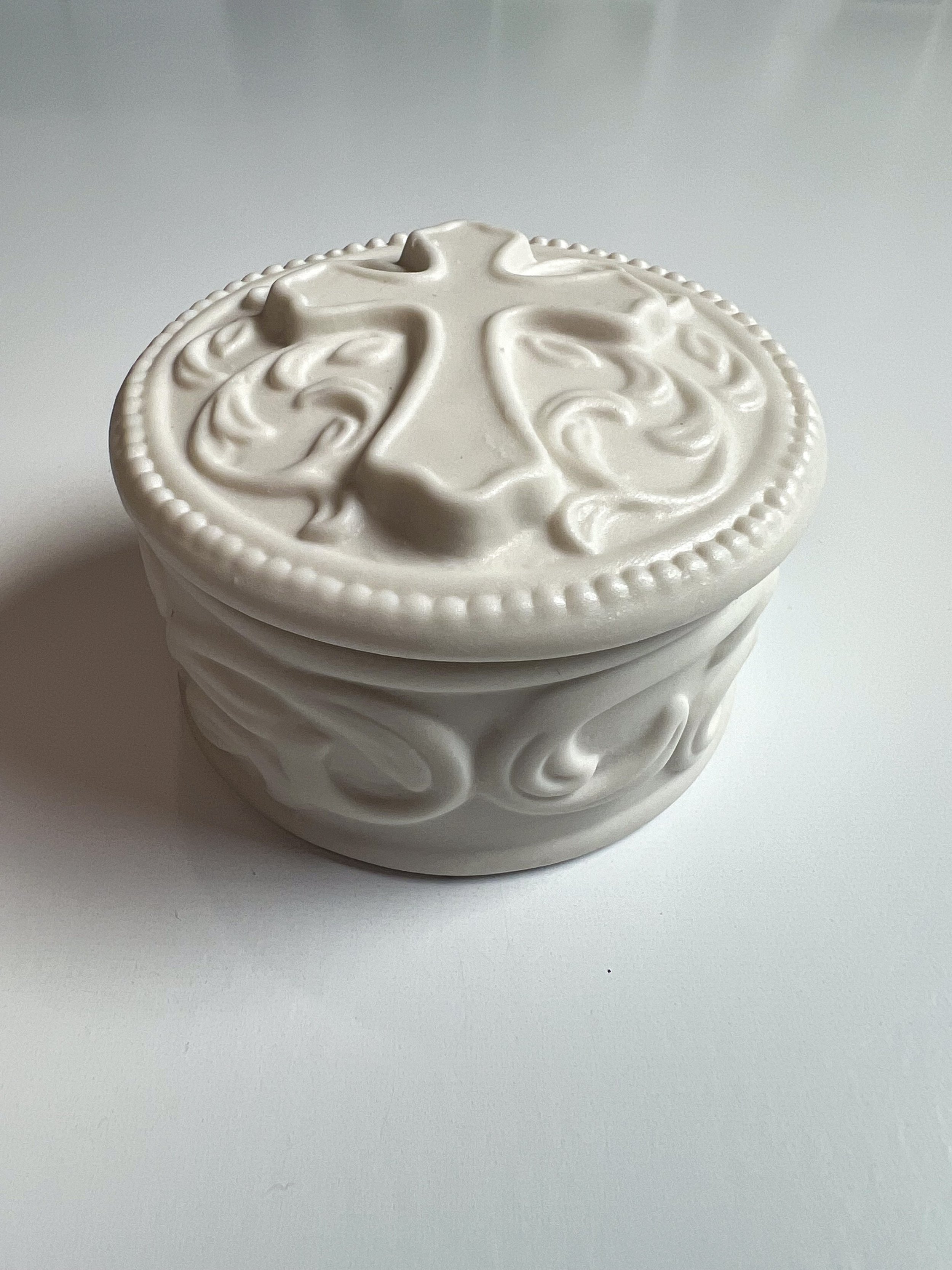 side of circular rosary box.jpg