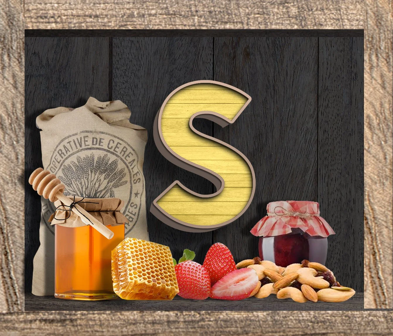 A display of honey, honeycomb, strawberries, nuts, jam, and a large decorative letter S on a wooden surface.