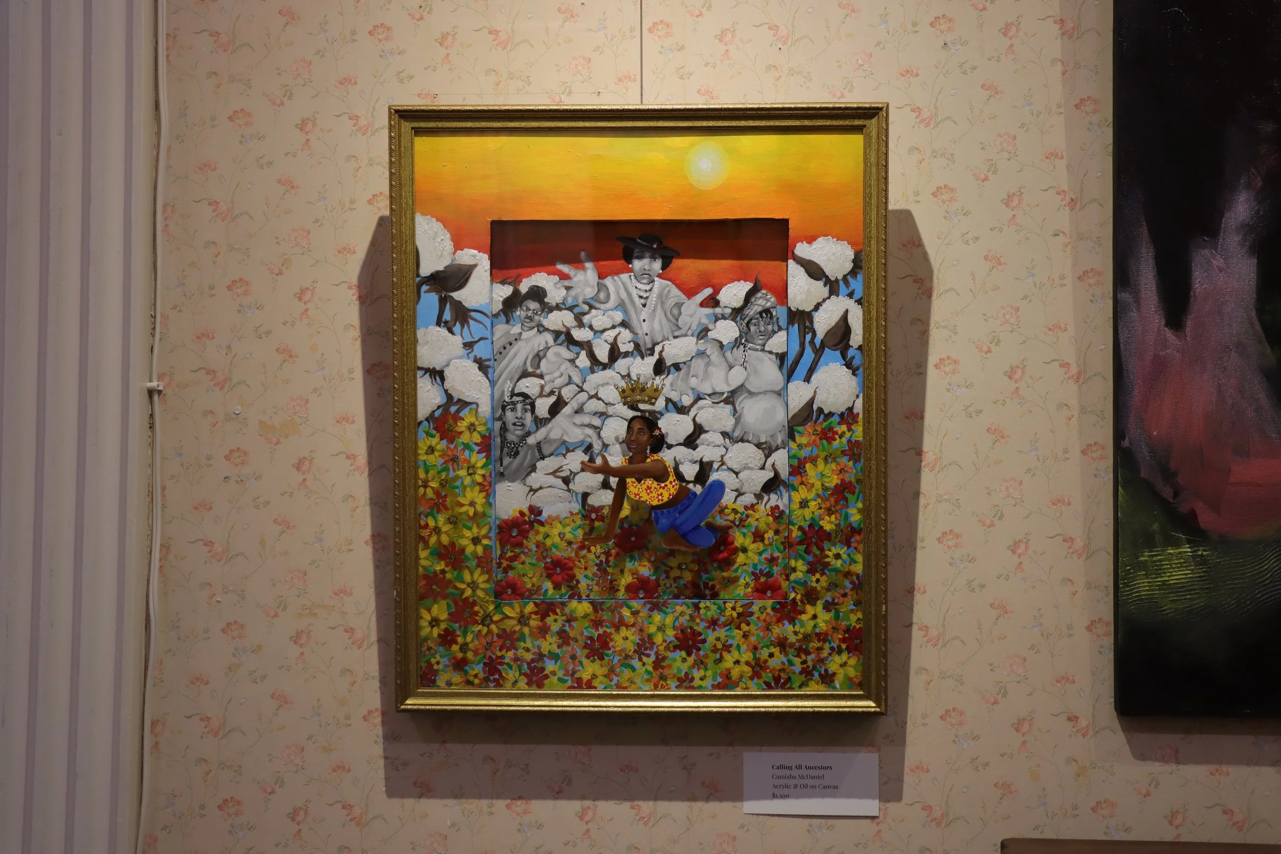 A mixed media artwork titled 'Cashing All Ancestors' by Camisha McDaniel, combining painting and oil on canvas, depicts several children surrounded by flowers and cotton with a sunset in the background.