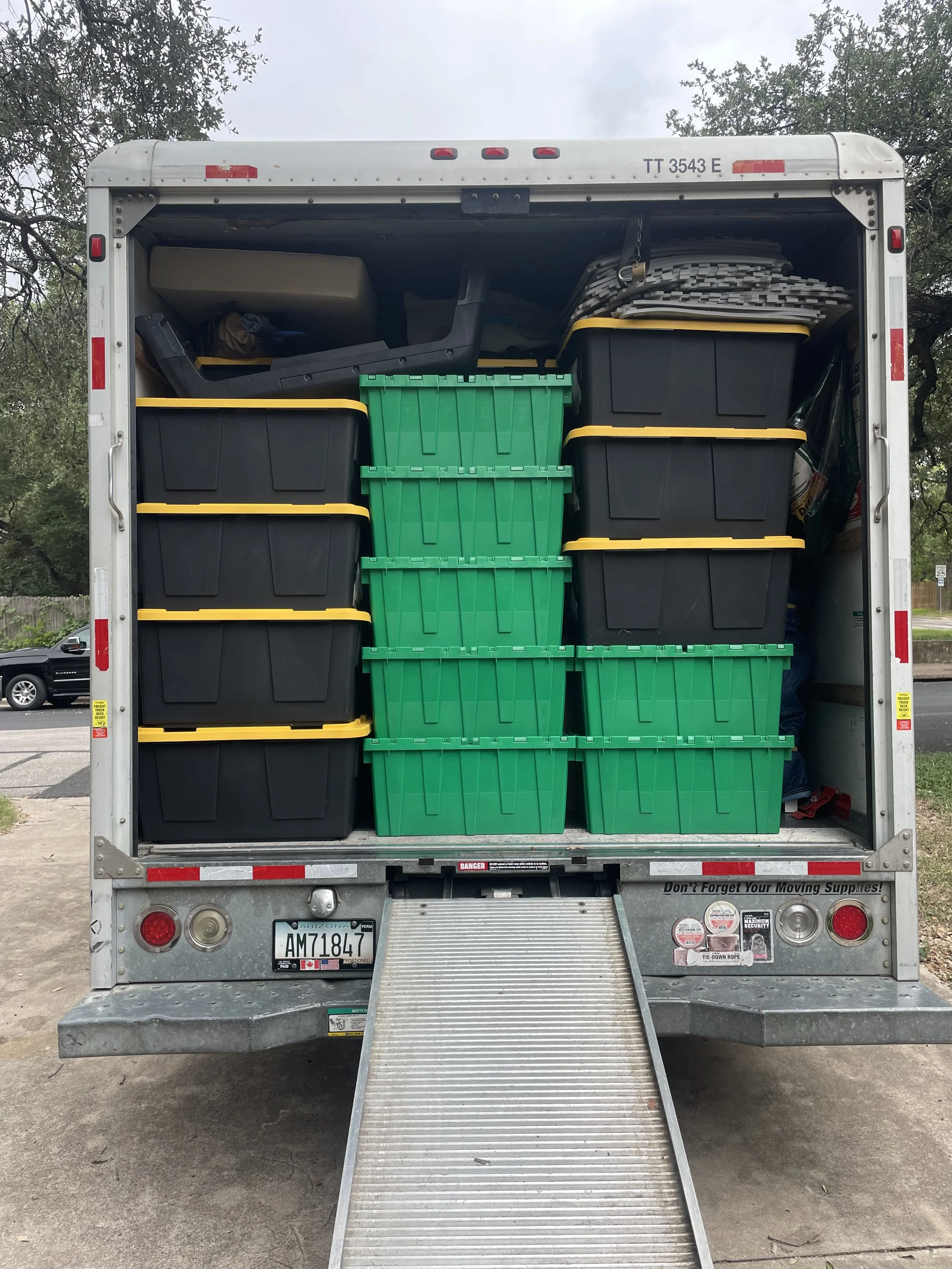 U-Haul moving help Austin, box truck movers Austin TX, trailer moving services Austin, moving truck loading and unloading.