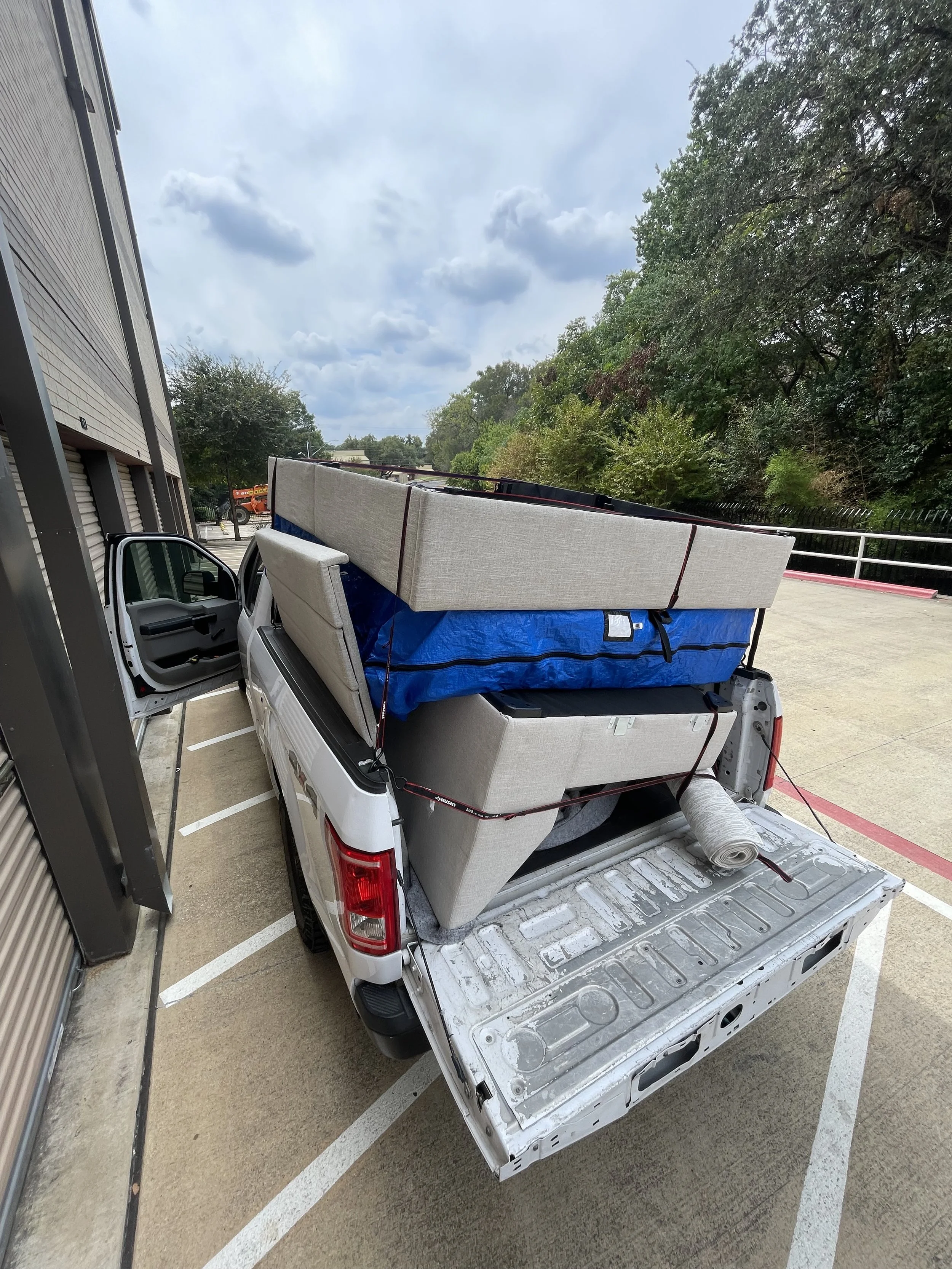 small pickup truck moving cheap bed furniture couch chair rug central austin texas