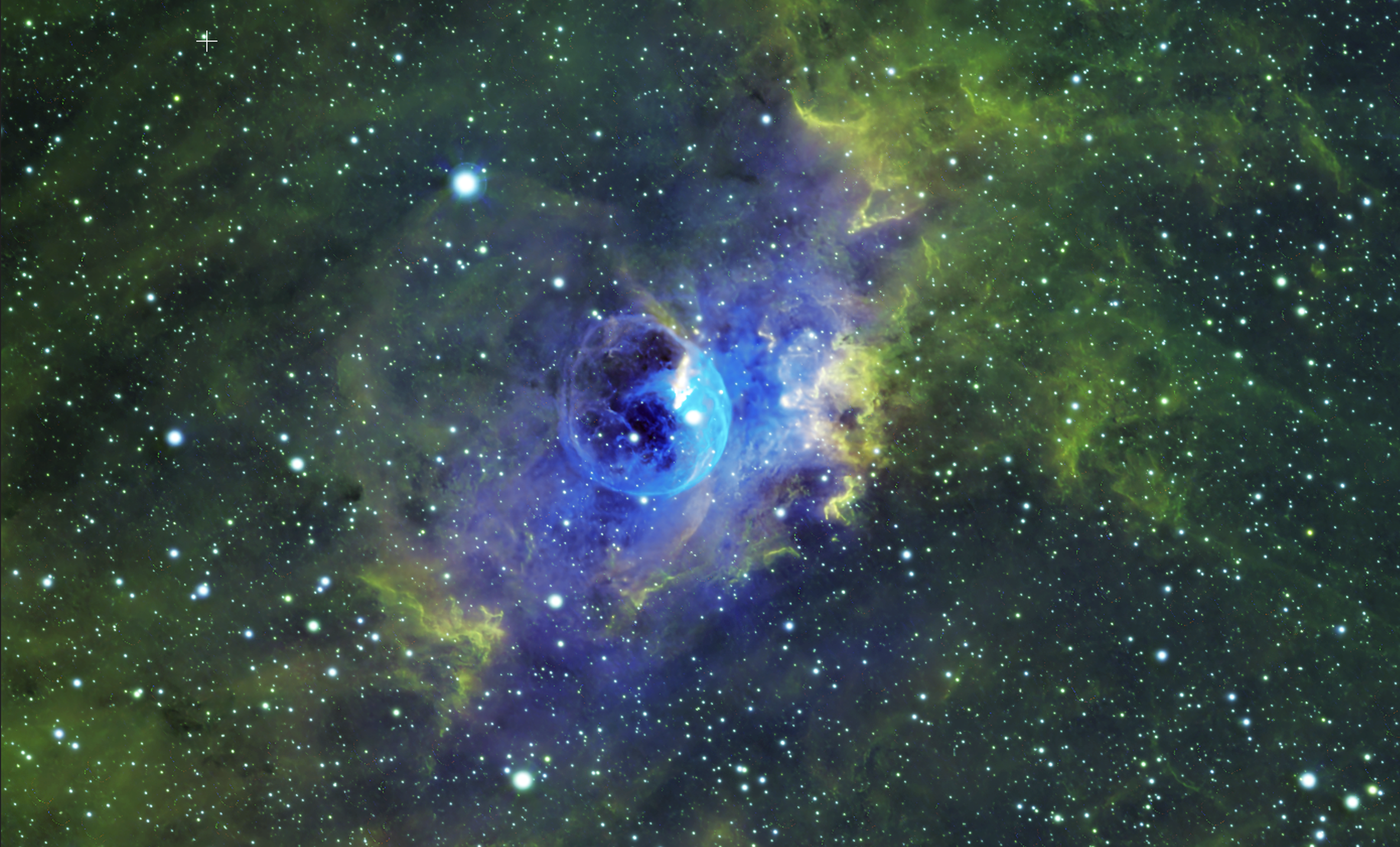 NGC 7635 The Bubble Nebula is 7100 light years from Earth and almost 7 light years across.  It is a dense, tilted bow-shock complex moving at supersonic speeds through a dense interstellar medium. The shell is expanding at 15km/sec.  The colors show 