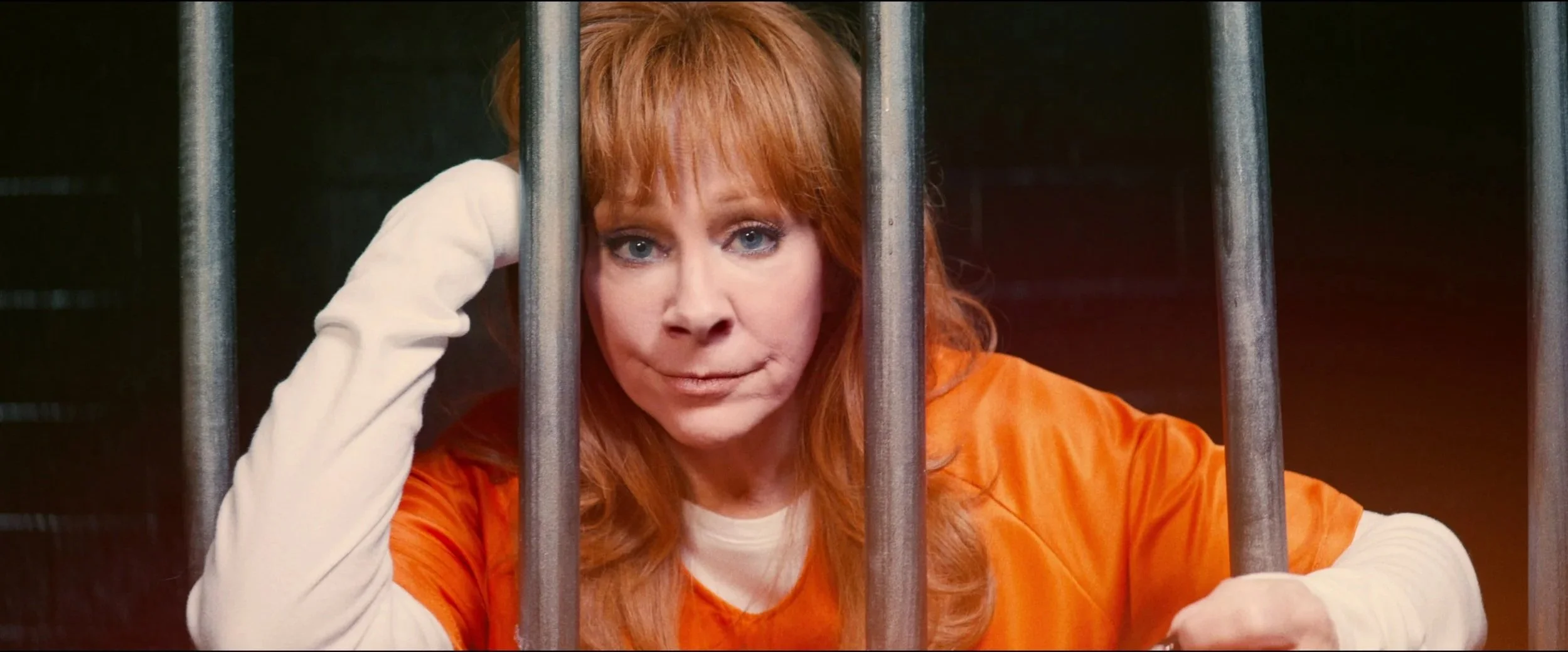 Reba Is Locked Up In “Ring Ring” Music Video