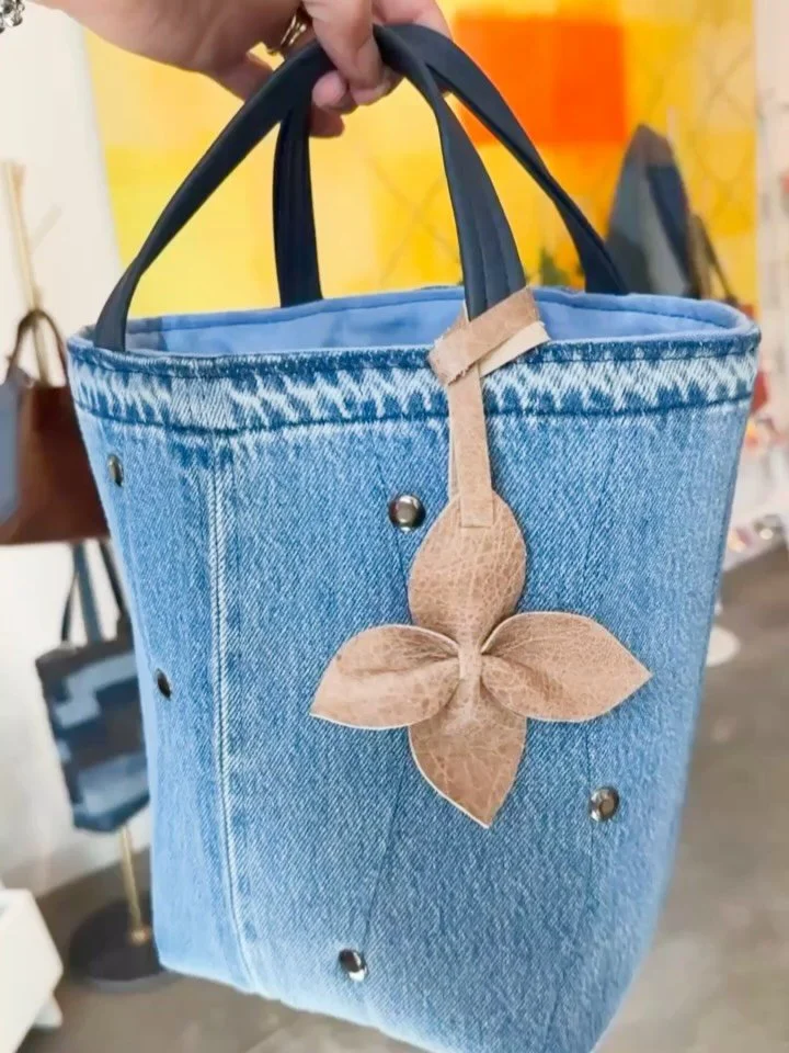 We&rsquo;ve got twins!

Two new Janette bags were just made in the studio. Hand-quilted on up-cycled premium denim, these bags feature a double interior Levi&rsquo;s pocket, a vegan leather handle, and gunmetal rivets. Super cool.

They&rsquo;re all 