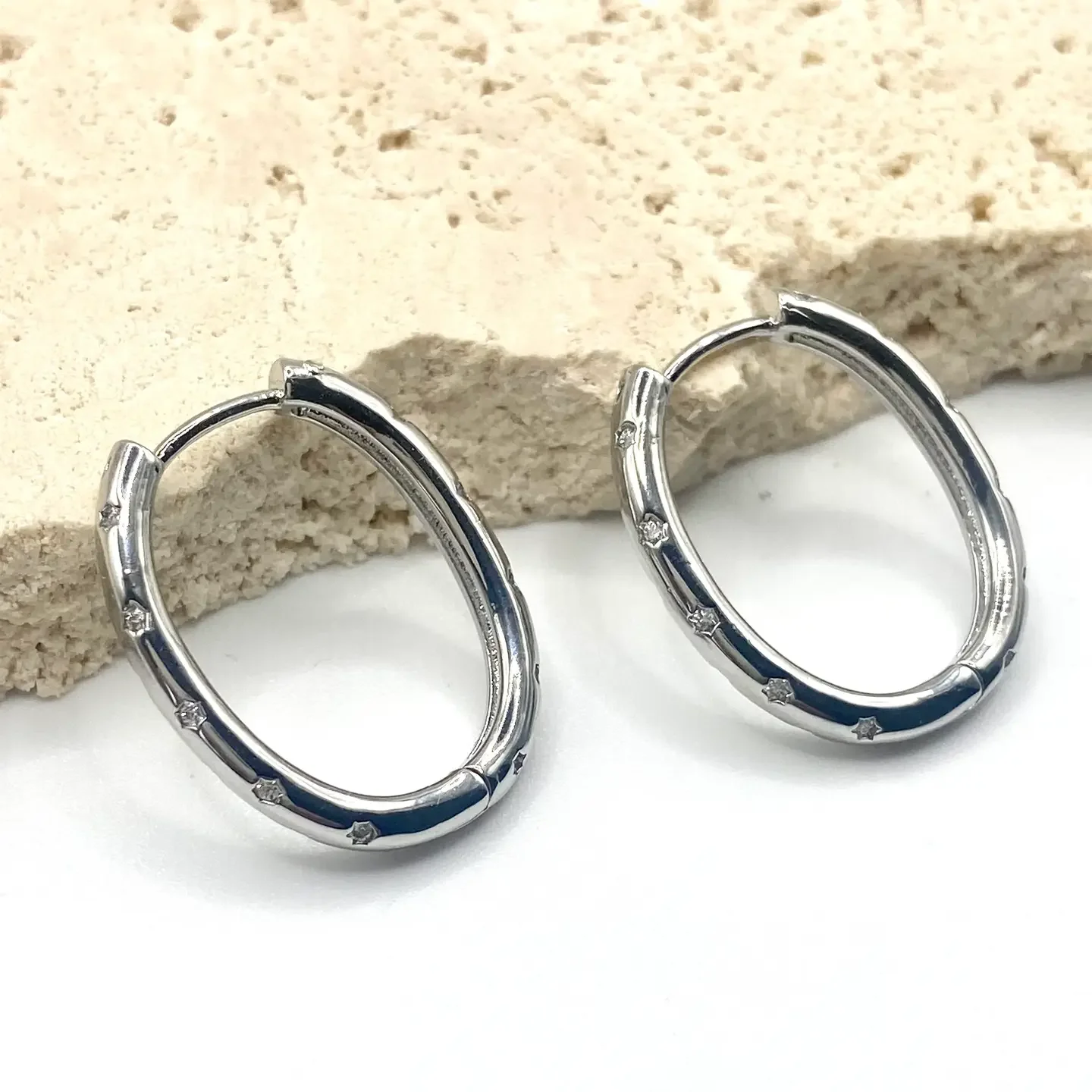 silver oval earrings.webp