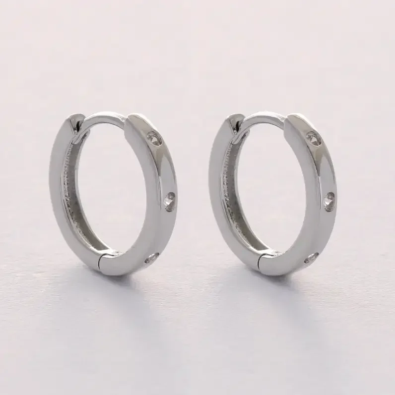 silver huggy hoops2.webp