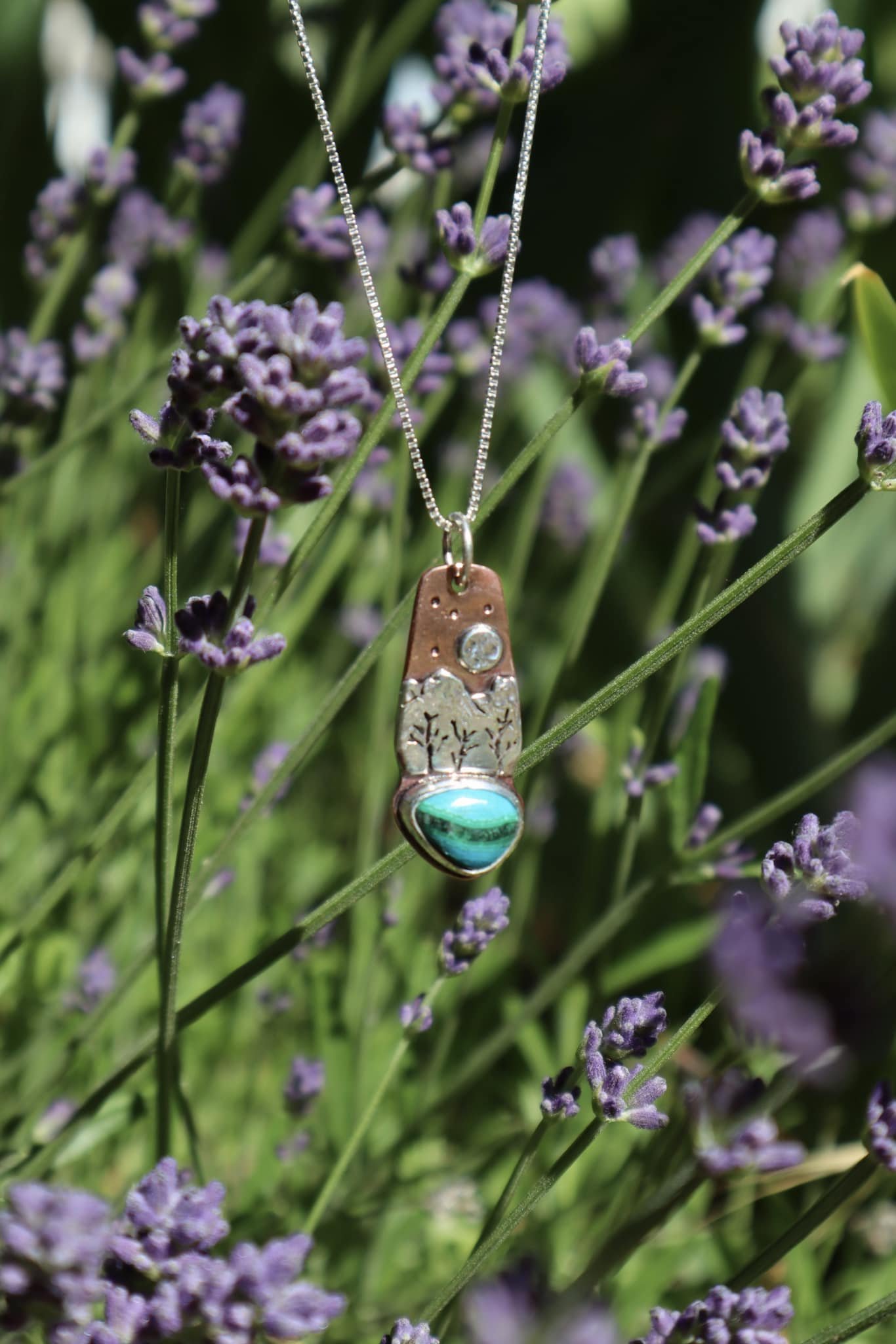 The lavender is in full bloom and summer is upon us. This pendant reminds me of camping lakeside under the big moon. 

You can find it Art Works Gallery Grass Valley

#sierrafoothills #pkleinjewelry #grassvalleyca #grassvalley #malachite #chrysocolla