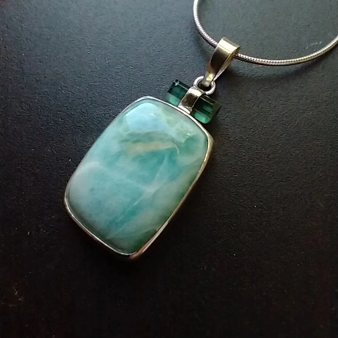 This one took a while to figure out! I love that little Green tourmaline accent. And there's just a little bit of green in the larimar, which made them a perfect match for each other. This will be in the gallery or DM me if you're interested. 

@artw