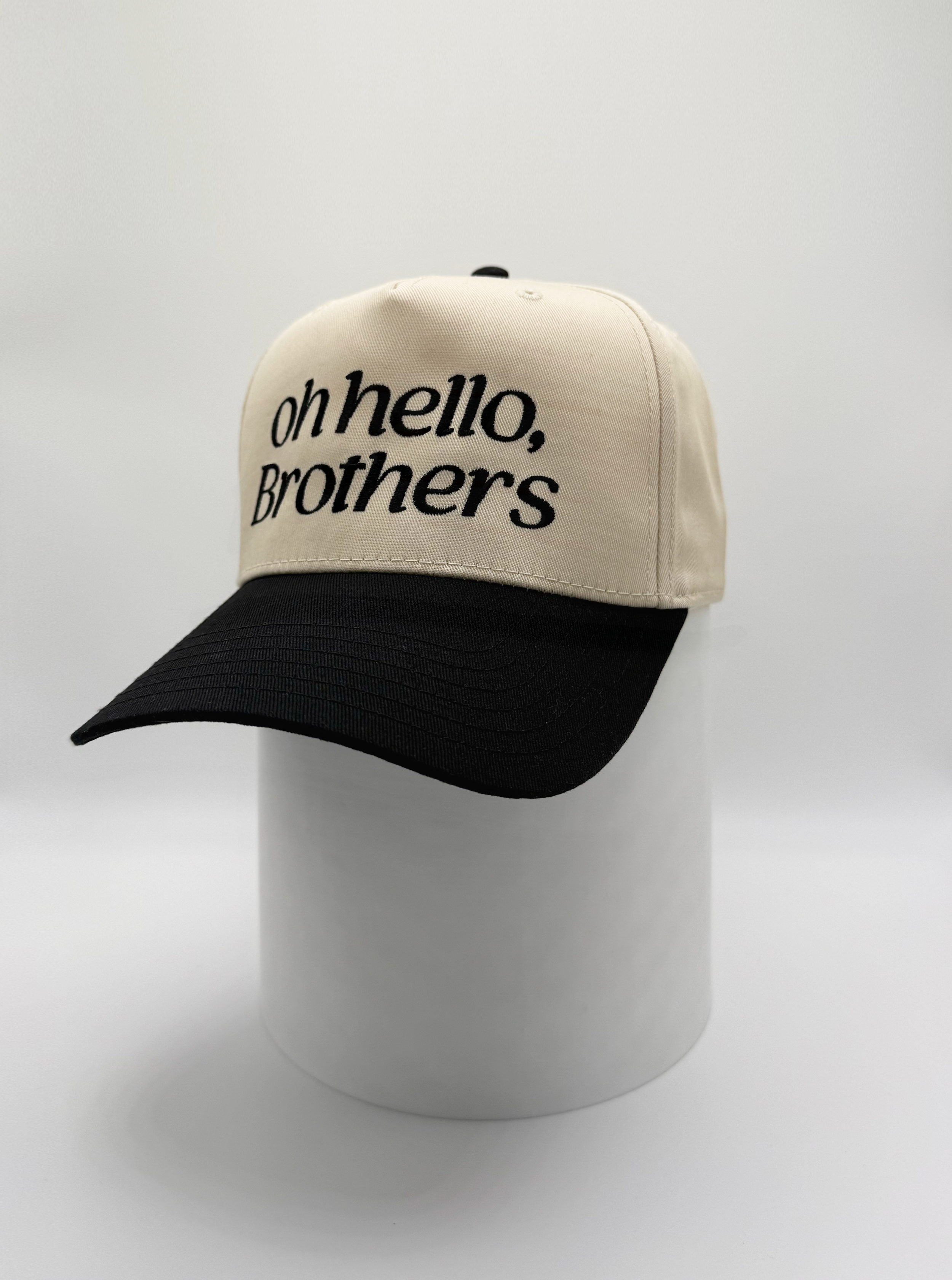 Cream and black snapback with “Oh hello, Brothers” embroidered on front and Mystic Falls text on side