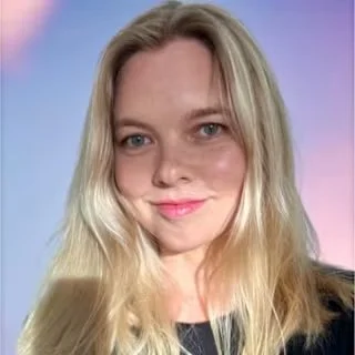 Kristin's photo of her smiling at the camera.