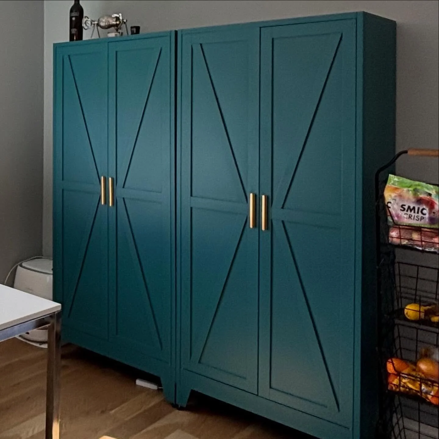 My clients built these two cabinets I found that hold up to 50 pounds per shelf. 

We made labeled sections for baking, sauces, candy, chef tools, canned veggies, fruit, jam, meds, bags and foil, and appliances. 

These would all be things that would